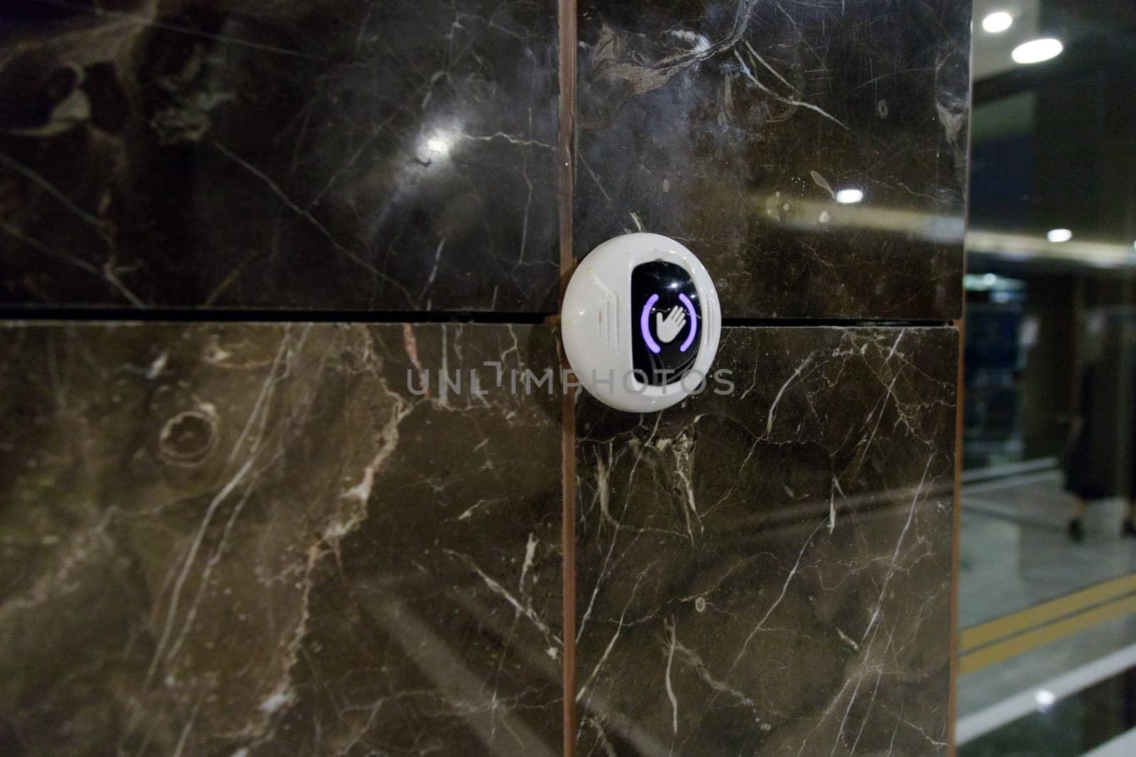 Sensor for opening the automatic entrance door in public place. Coronavirus