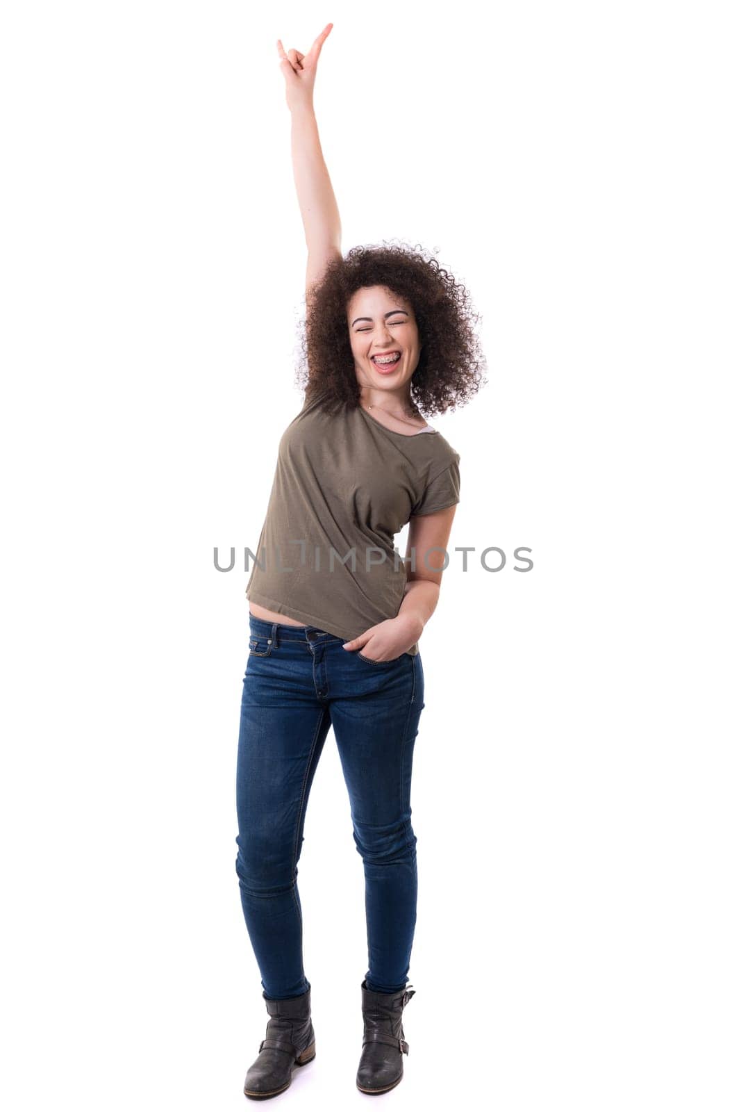Very happy woman raising her arms and celebrating