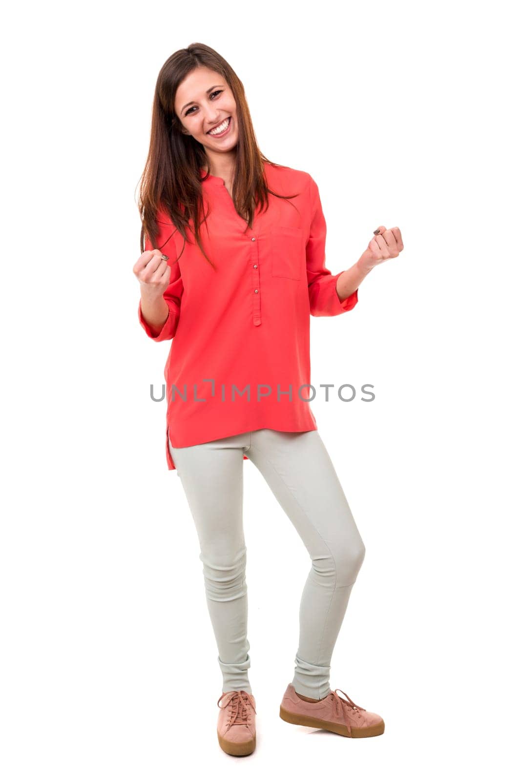 Beautiful young woman signaling ok, isolated over white