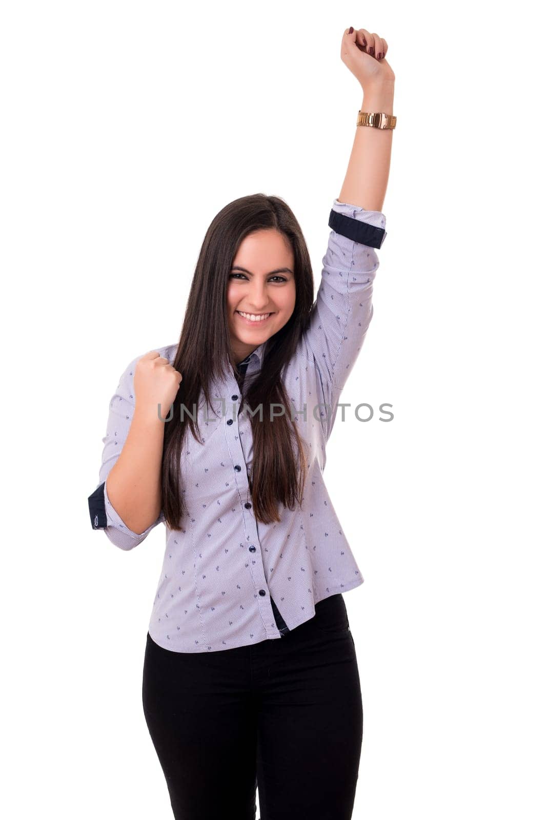 Studio shot: Happy woman with raised arms