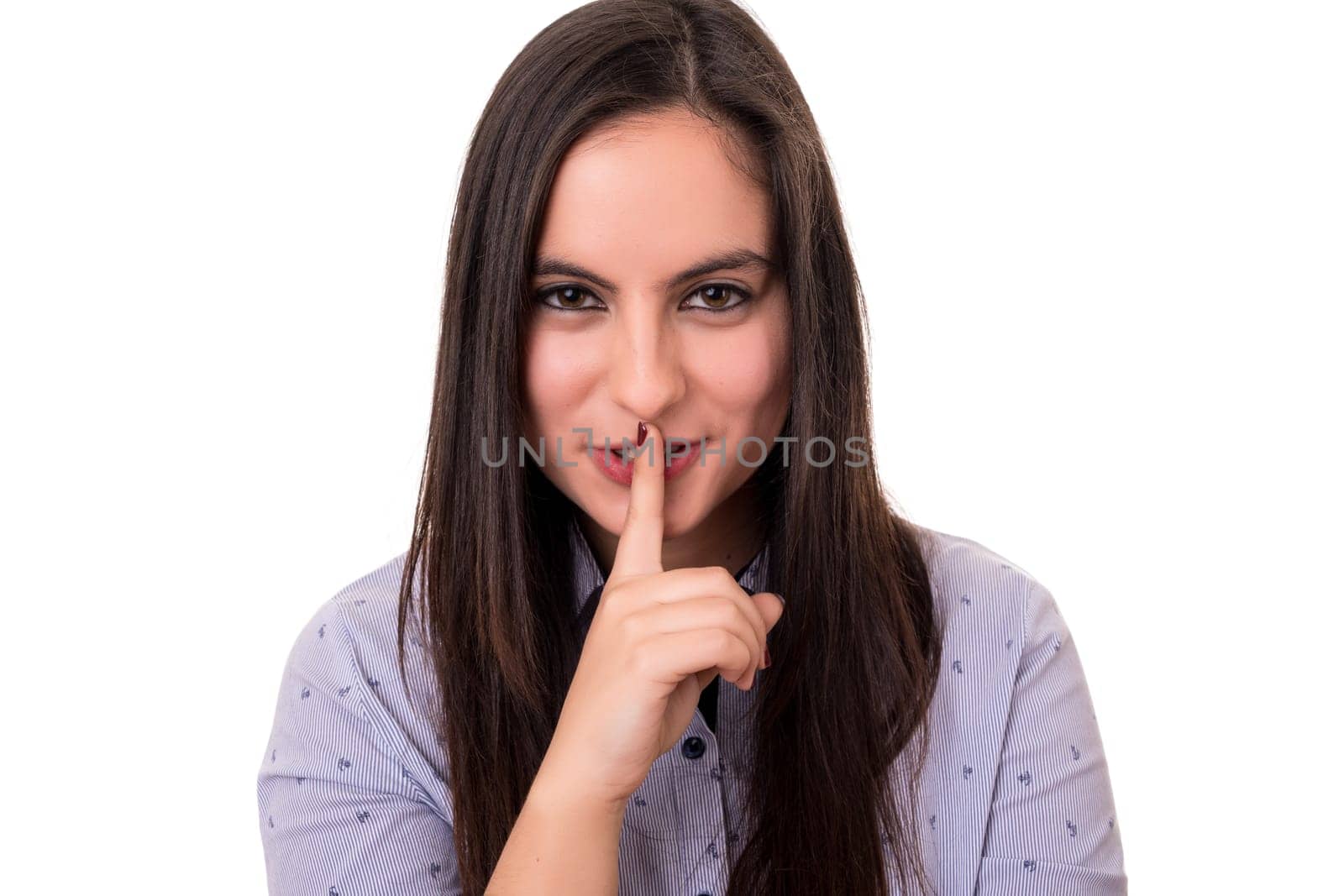 Beautiful young woman asking for silence isolated