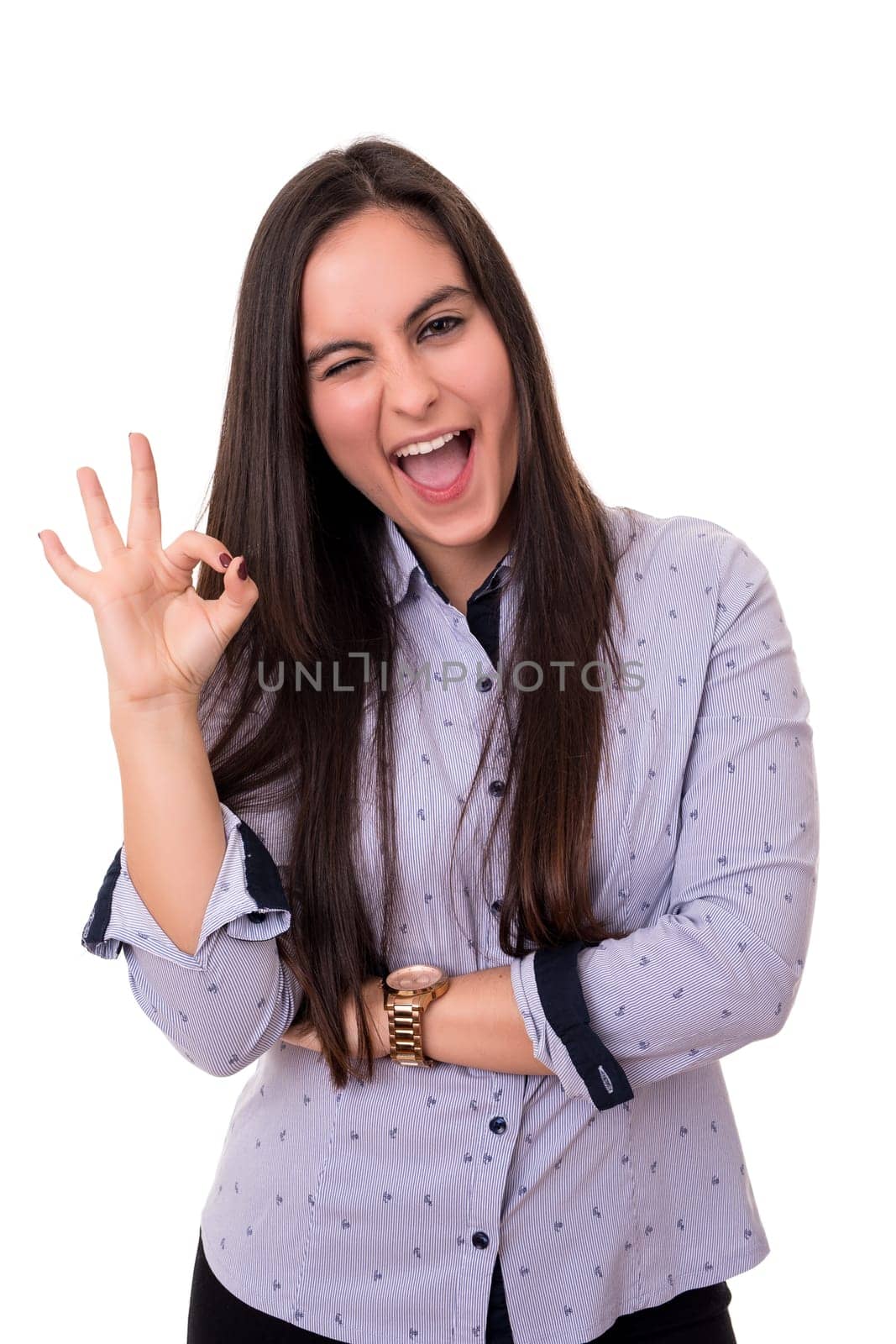 Beautiful young woman signaling ok, isolated over white