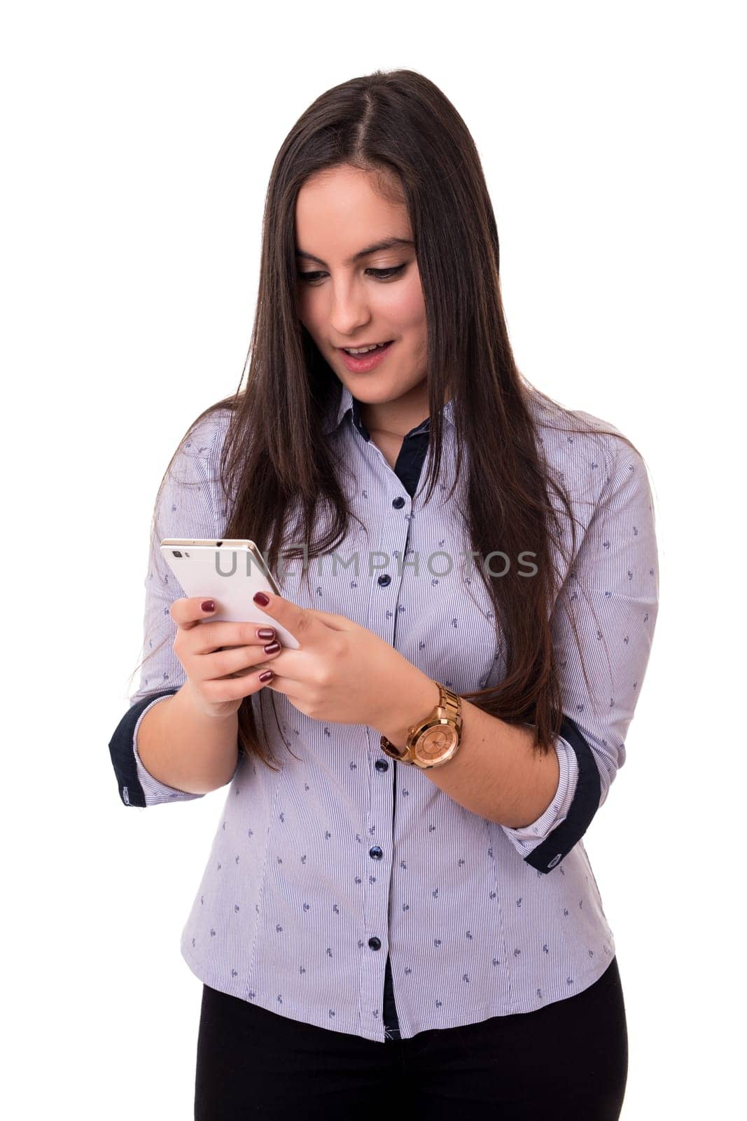 Young beautiful woman at the phone, isolated over a white background