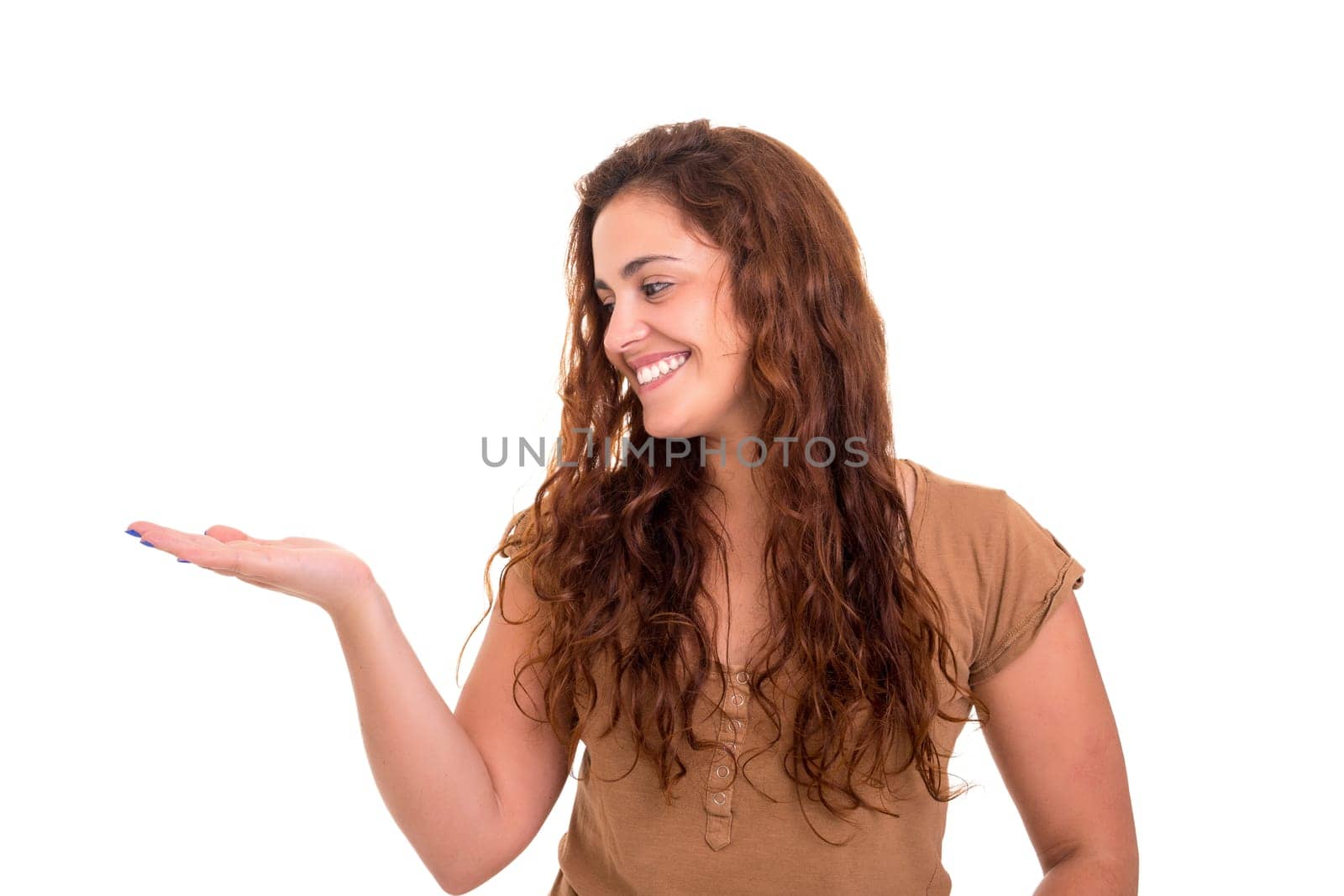 Young beautiful woman presenting your product, isolated over white background