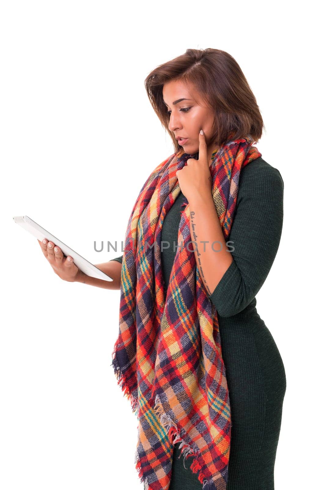 Young african woman working with her tablet computer, isolated over a white background
