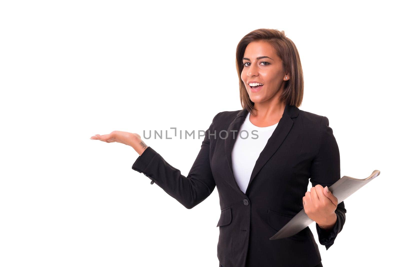 Young beautiful african woman presenting your product, isolated over white background