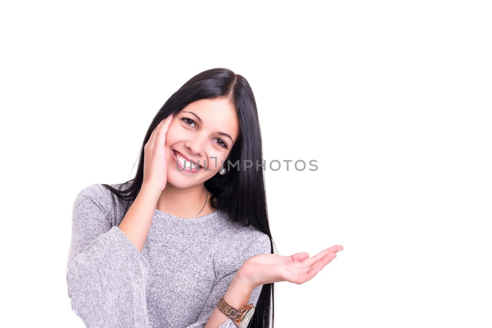 Young beautiful woman presenting your product, isolated over white background