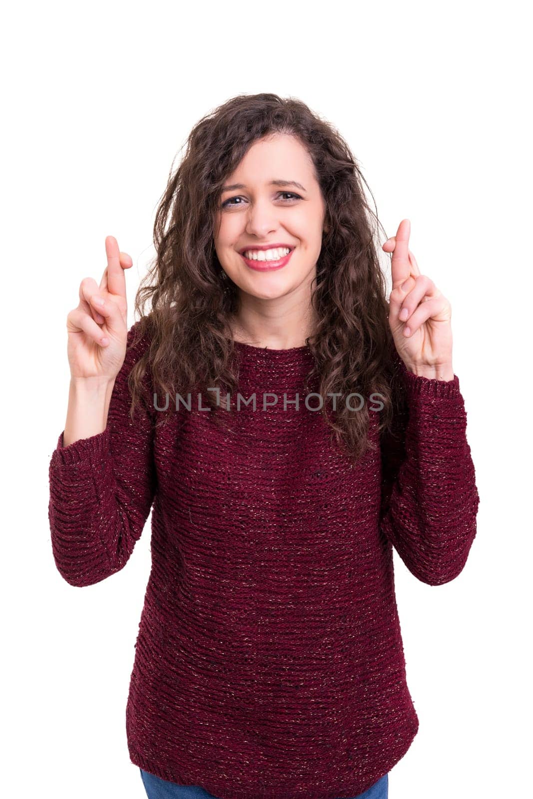 Woman with crossed fingers, isolated over a white background