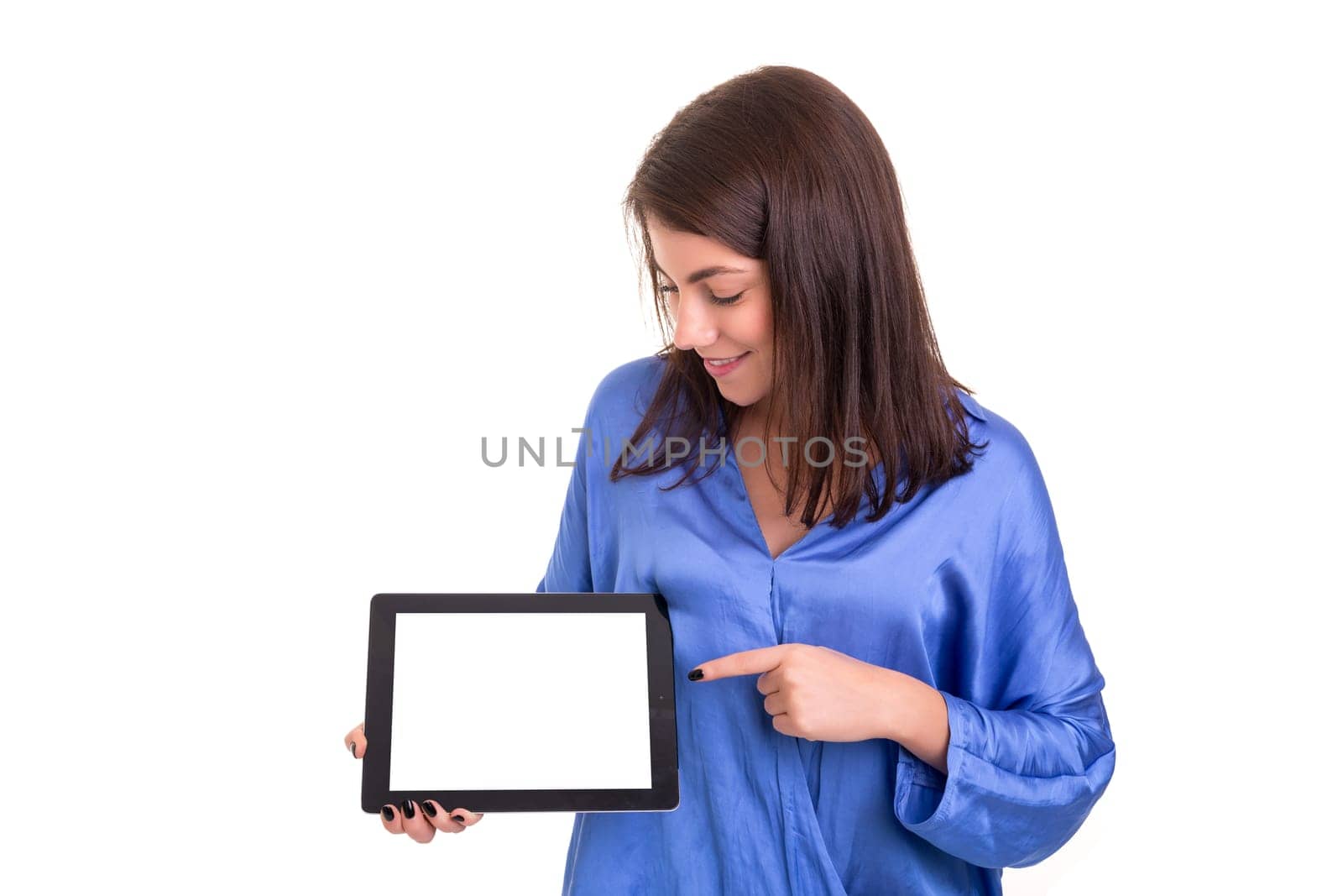 Happy young woman presenting your product in a tablet computer