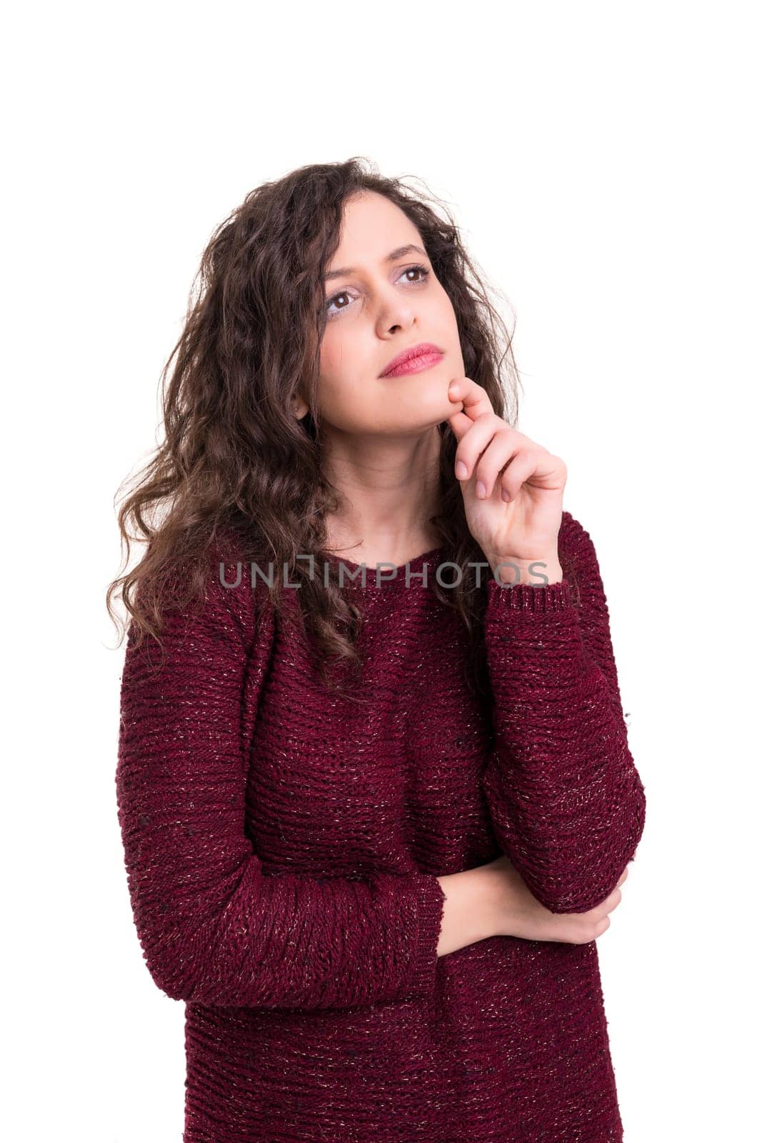 Studio shot: Young woman having a great idea