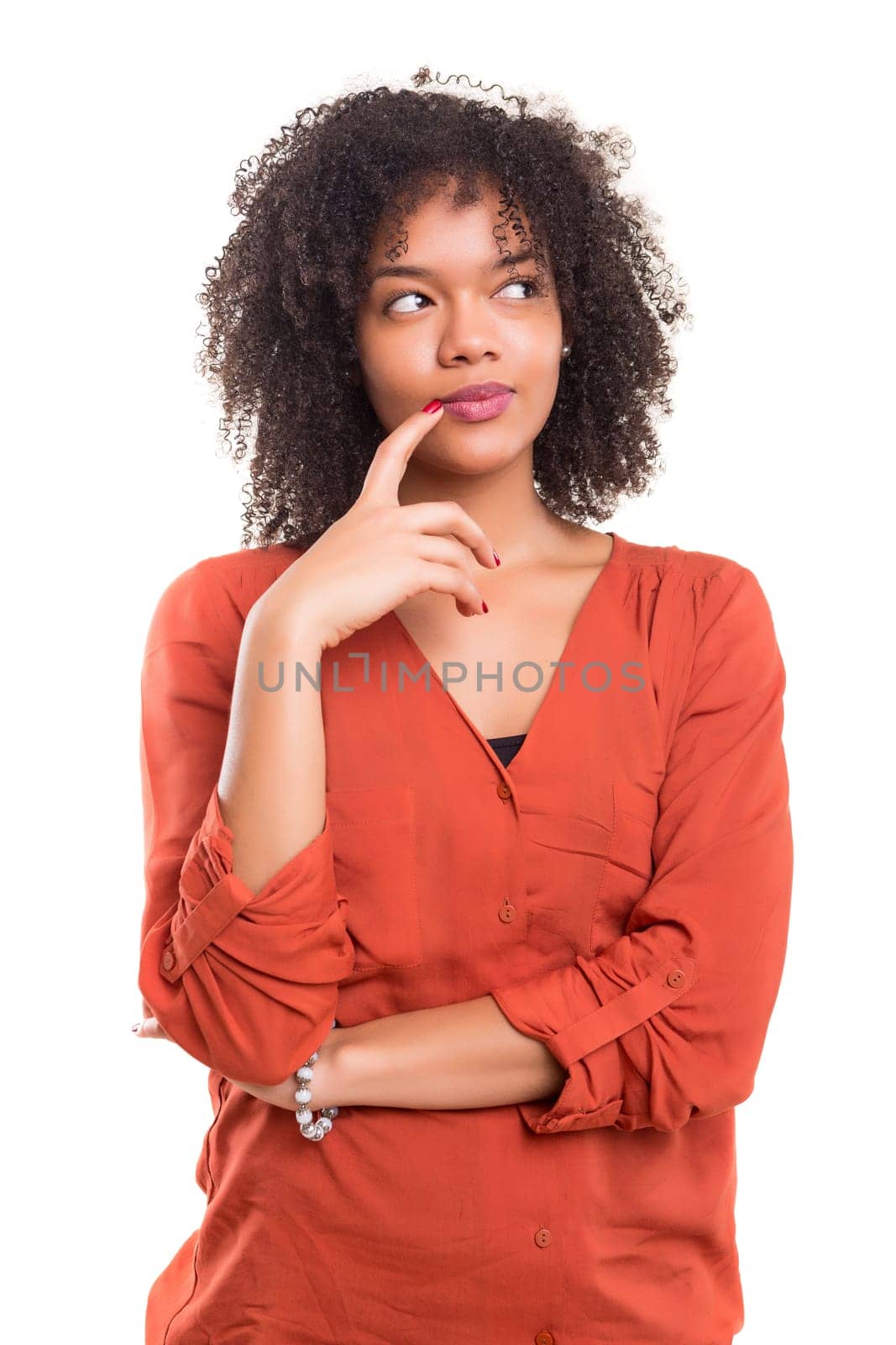 Studio shot: Young woman having a great idea