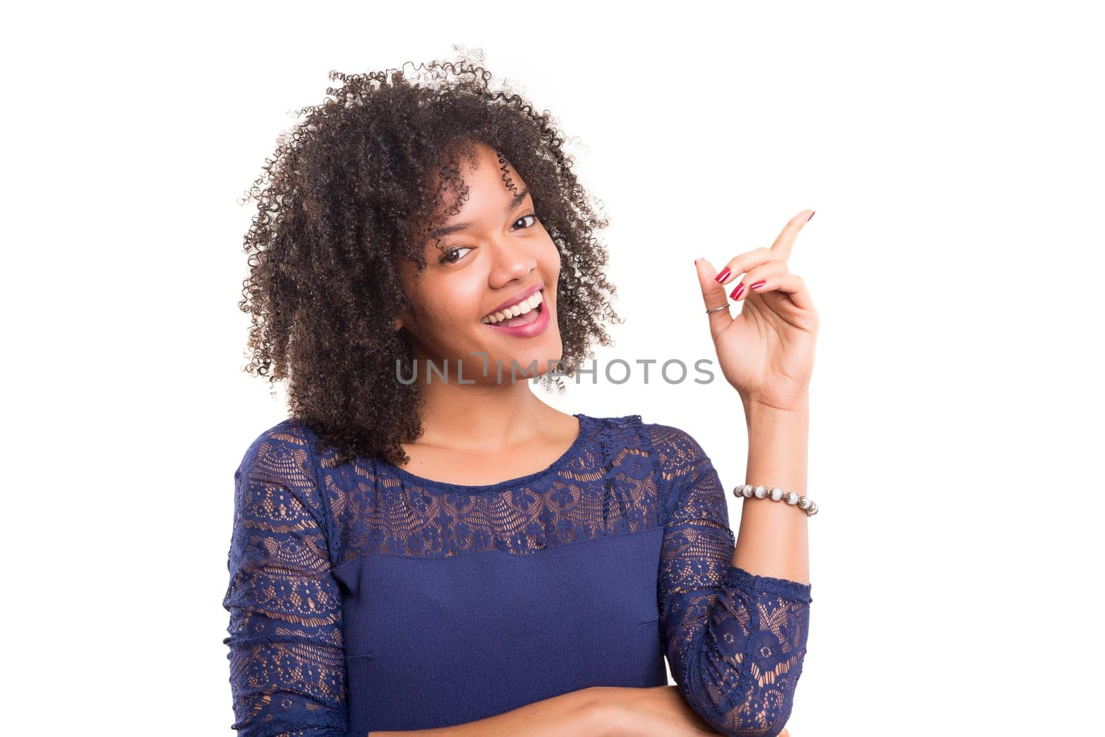 Young beautiful african woman presenting your product, isolated over white background