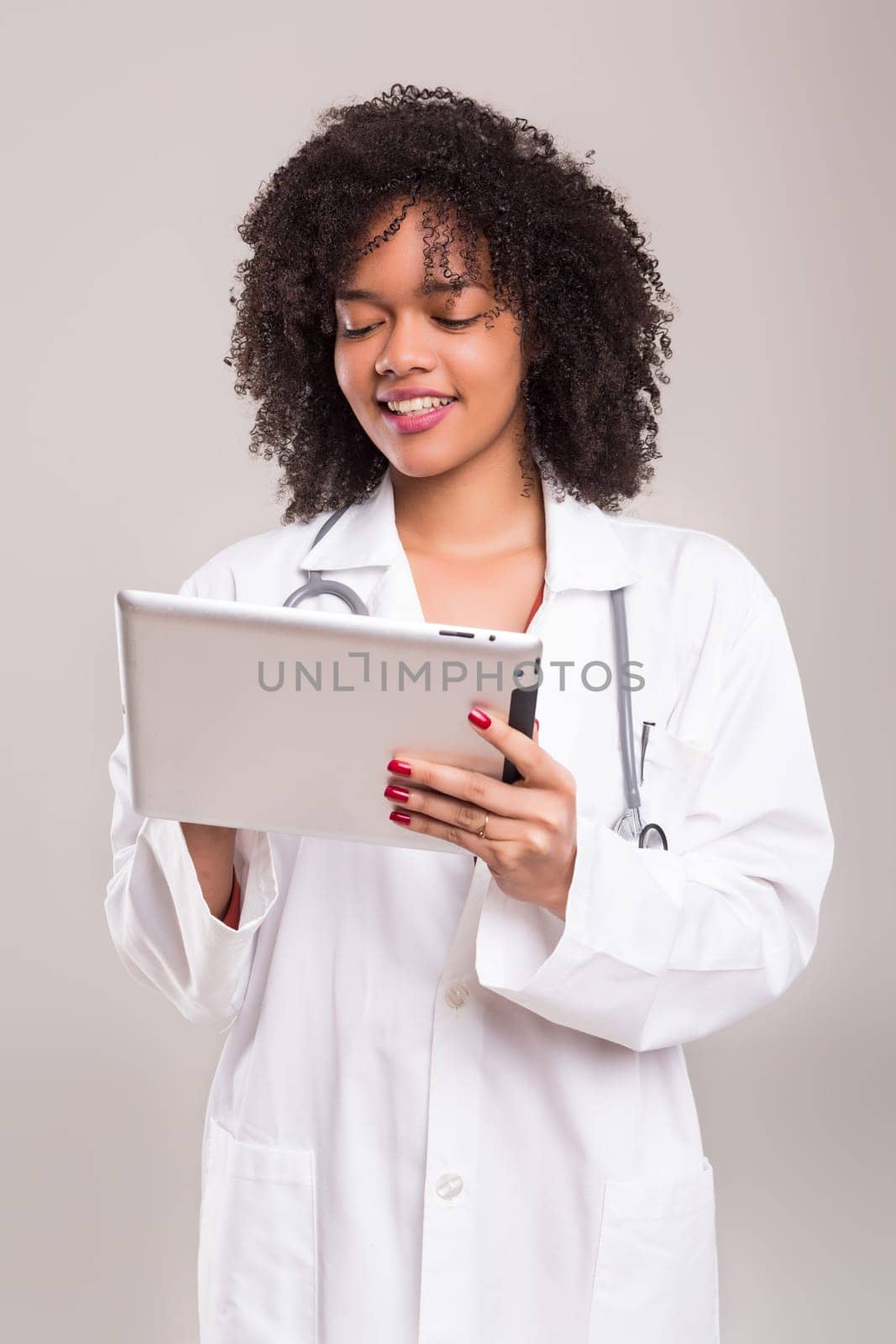 Studio shot of a beautiful african doctor