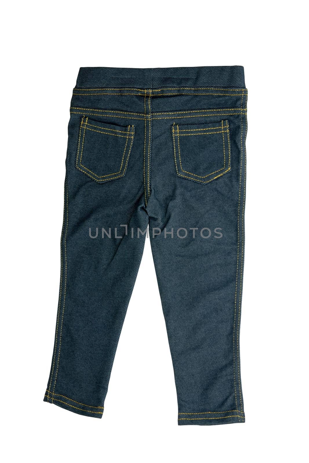 Jeans isolated. Trendy stylish blue denim pants or trousers for child boy isolated on a white background. Jeans summer and autumn fashion. Back view.