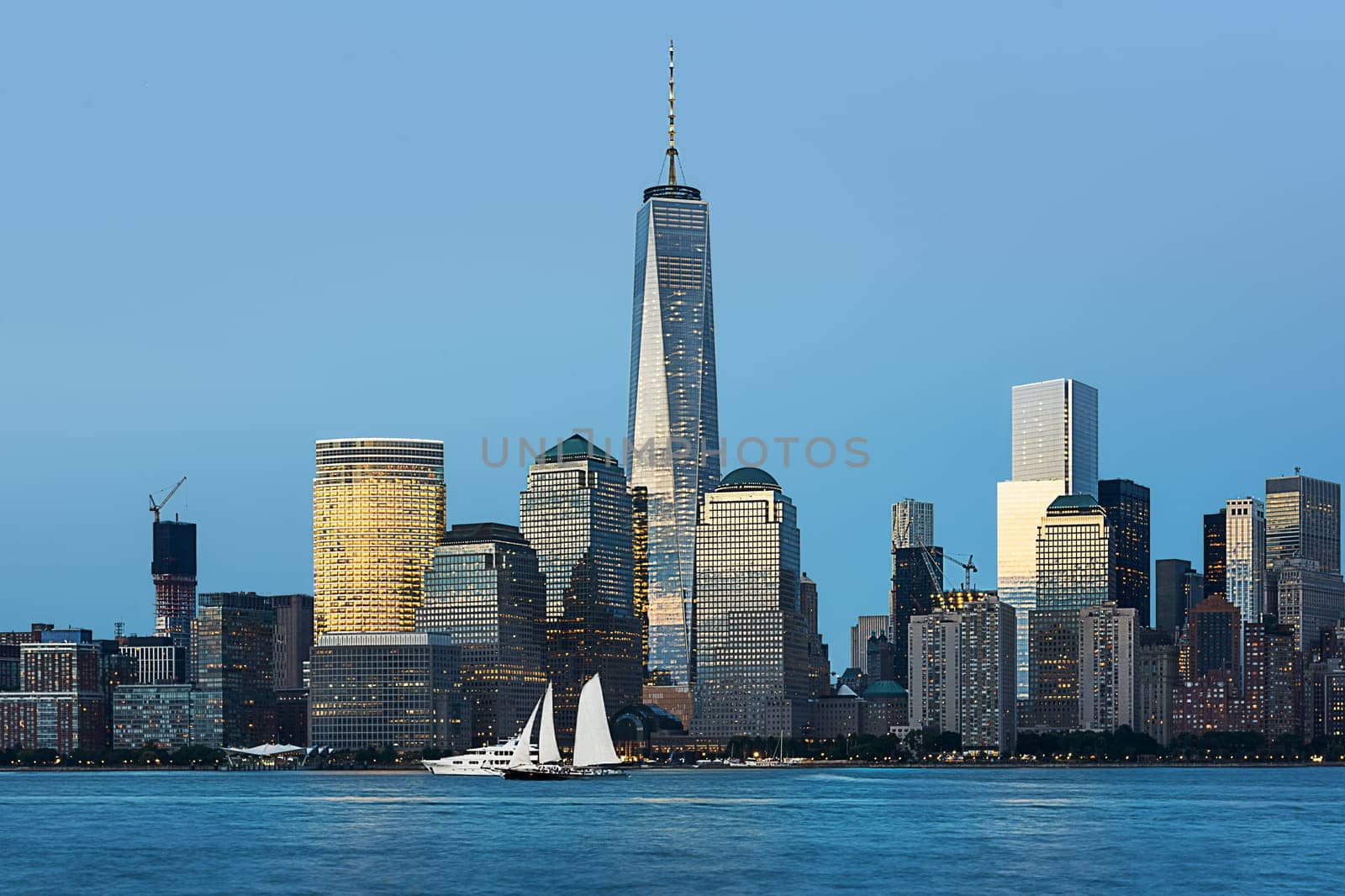 New York City skyline with urban skyscrapers at sunset, USA.