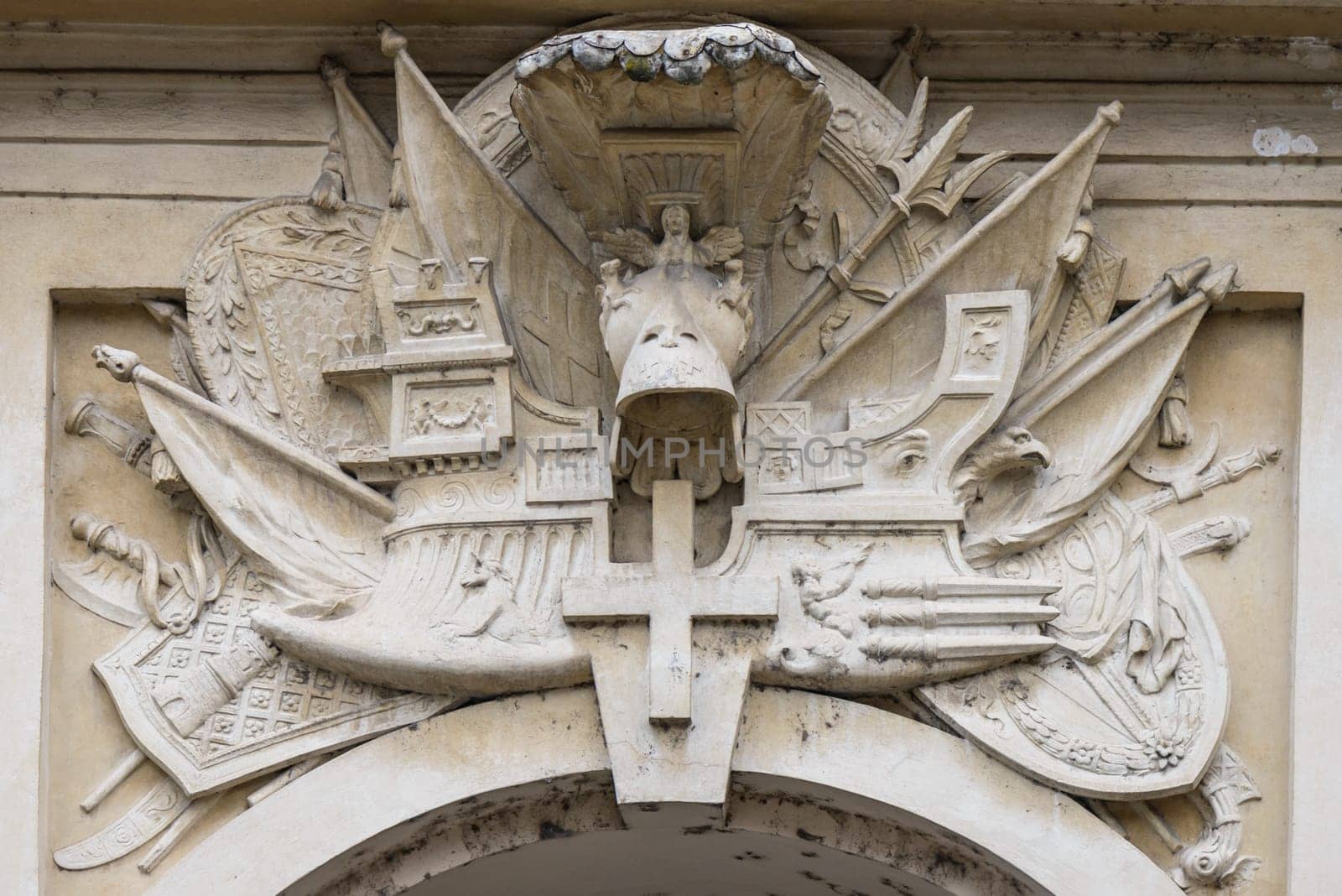 Embossed Ship over a door of The garden of the Oranges