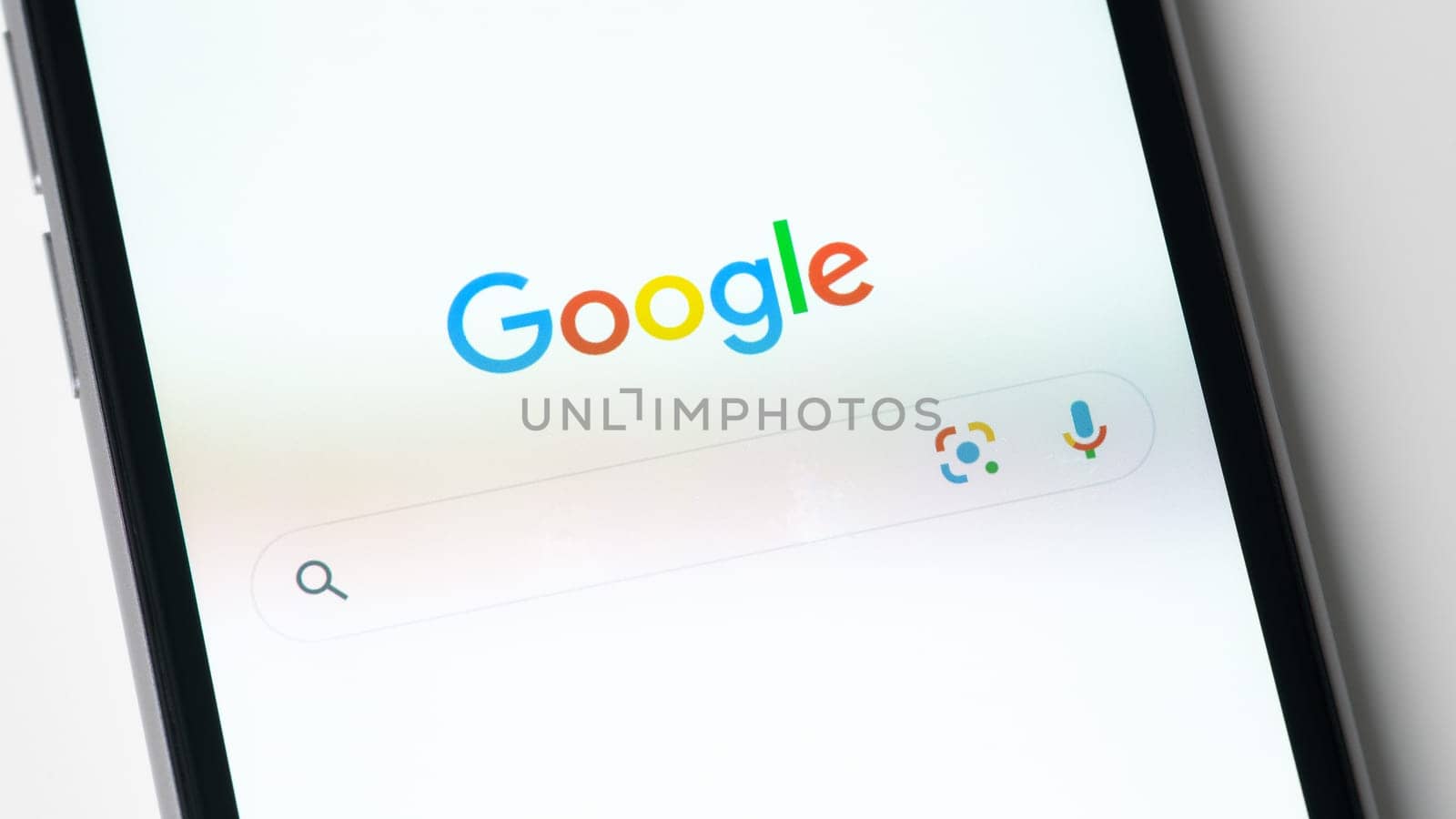 BAYONNE, FRANCE - CIRCA JANUARY 2021: Google app on Apple iPhone 6S screen. The google app gives access to the Google search engine.