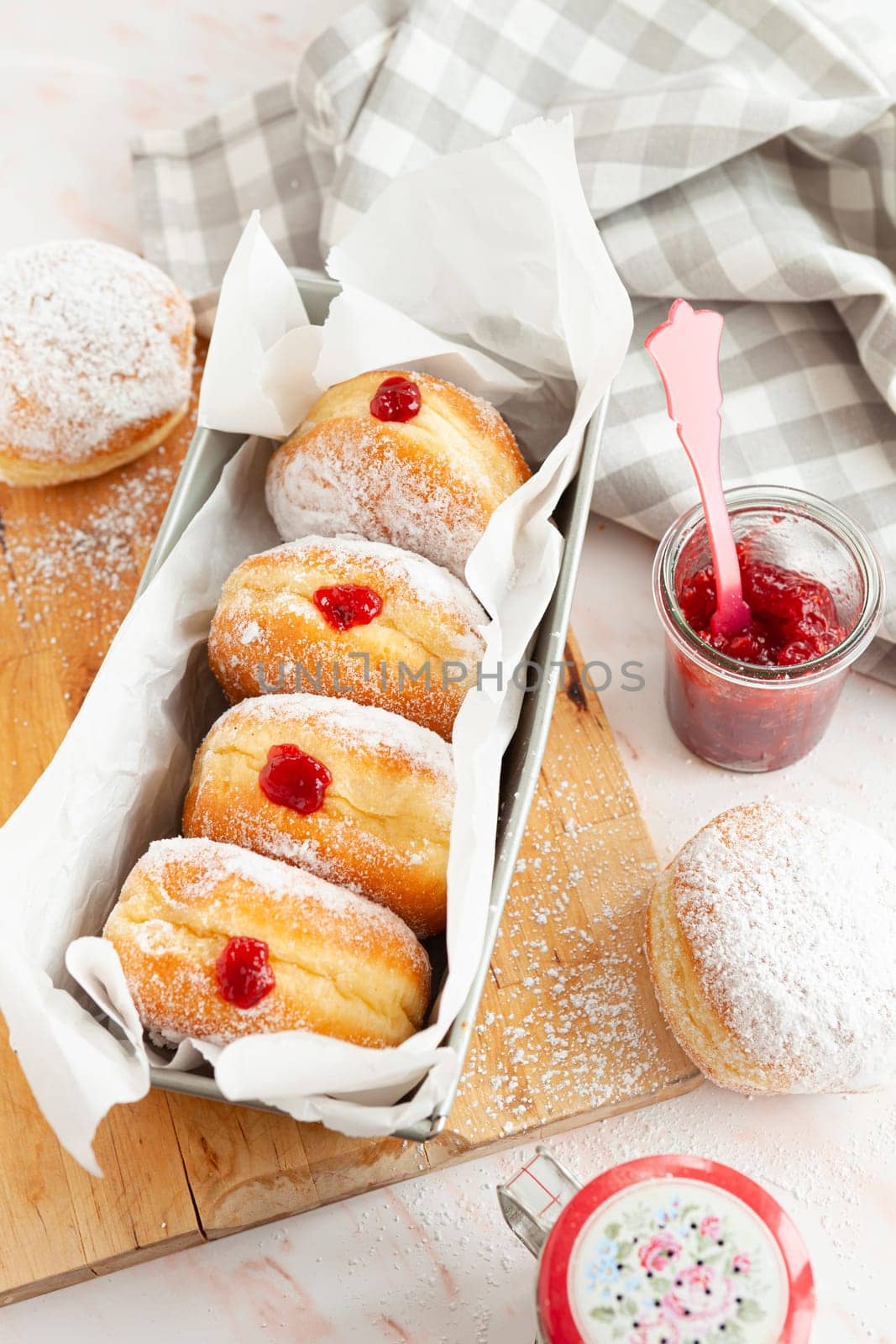 Delicious German donuts filled with jam and powderd sugar