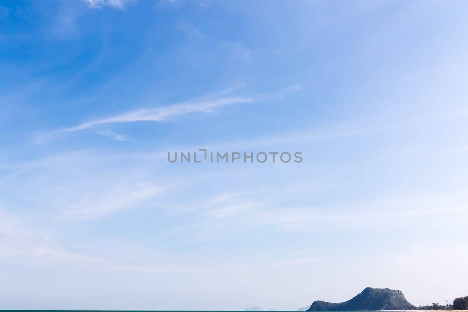 White fluffy clouds in the blue sky, Fantastic soft white clouds against blue sky