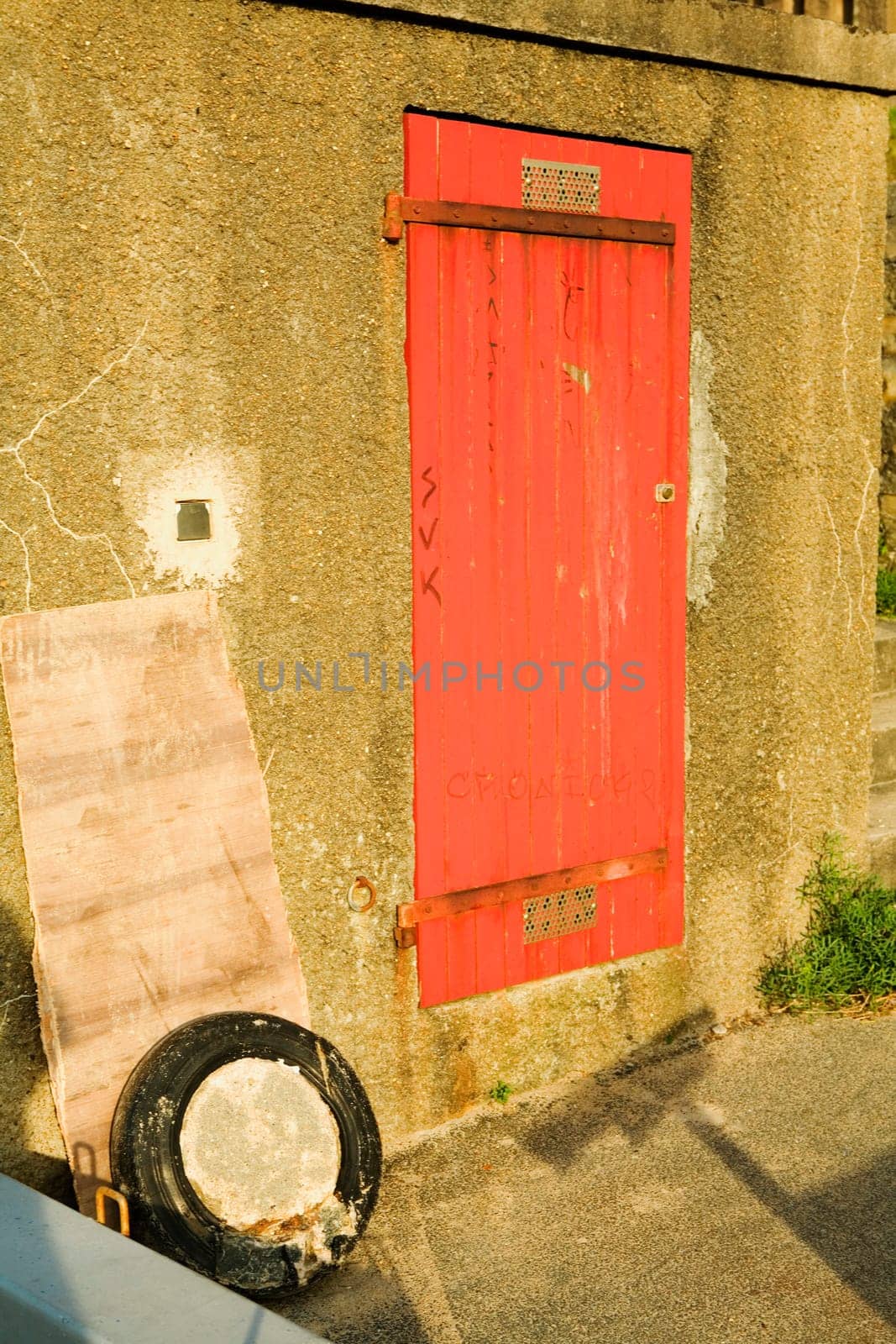 Closed door in a concrete wall