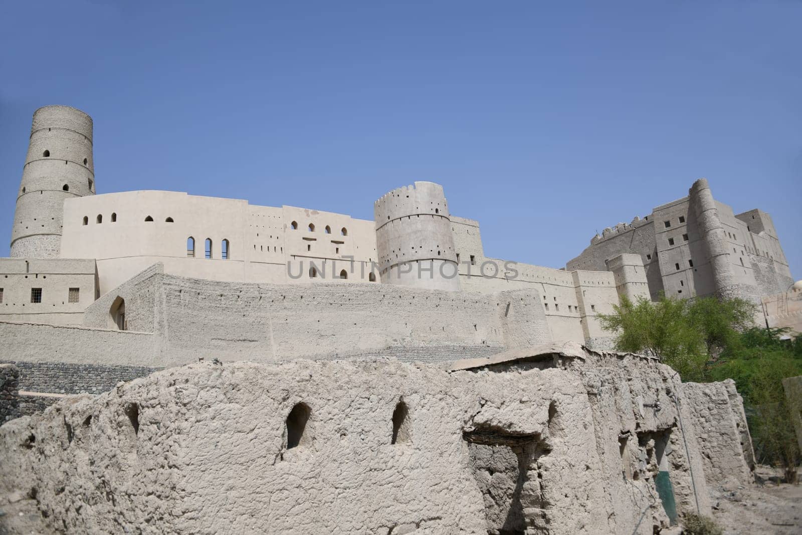 The great fortress Hisn Tamah,built in the 17th century in the oasis city of Bahla,is located at the foot of the Jabal al Achdar Mountains. It was built from traditional building materials.