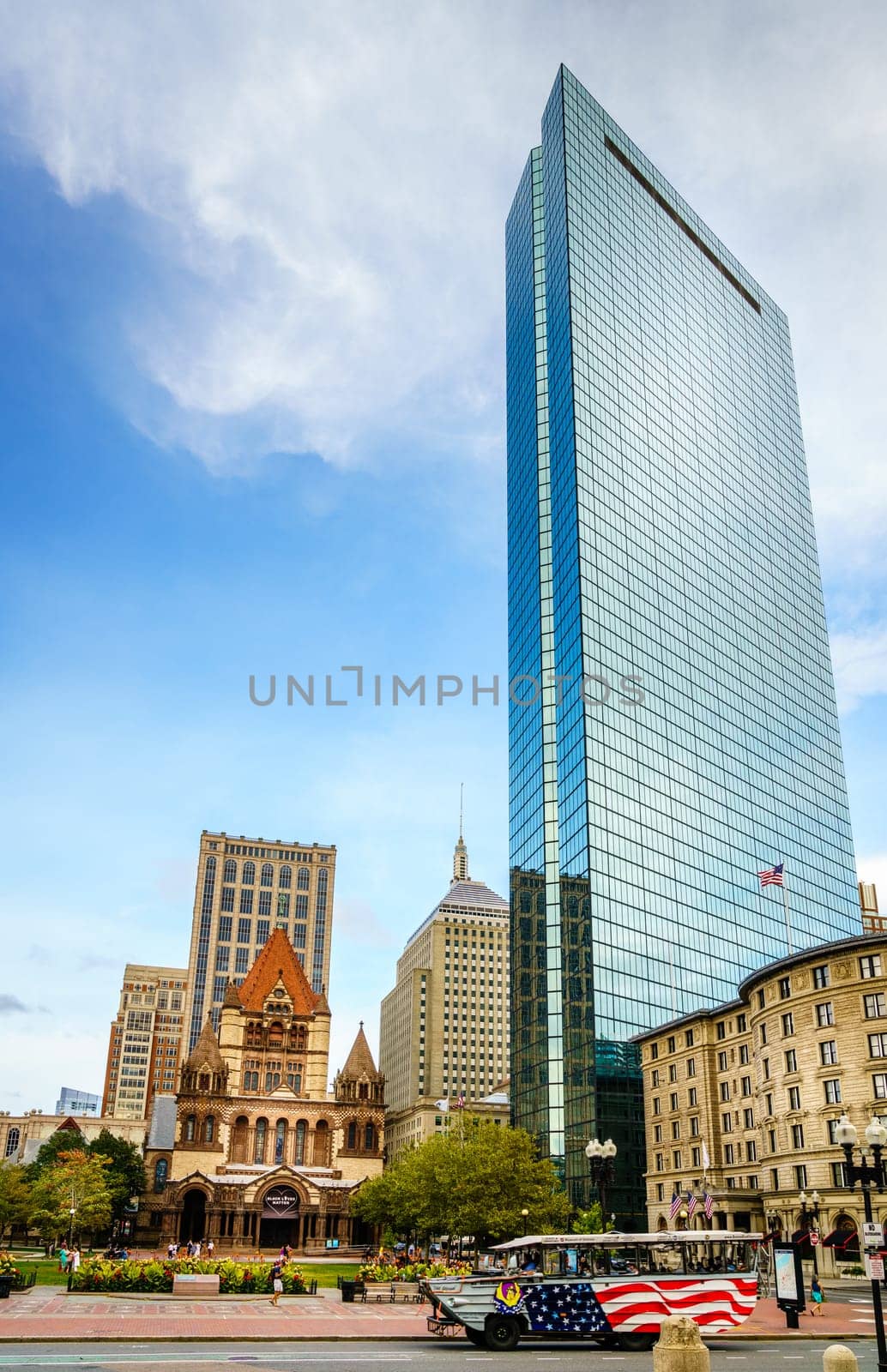 Boston, MA, September 27, 2020: John Hancock Tower and Trinity Church in downtown Boston