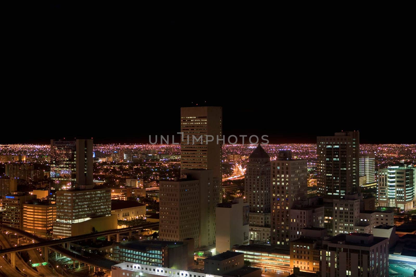 High angle view of a city at night, Miami, Florida, USA