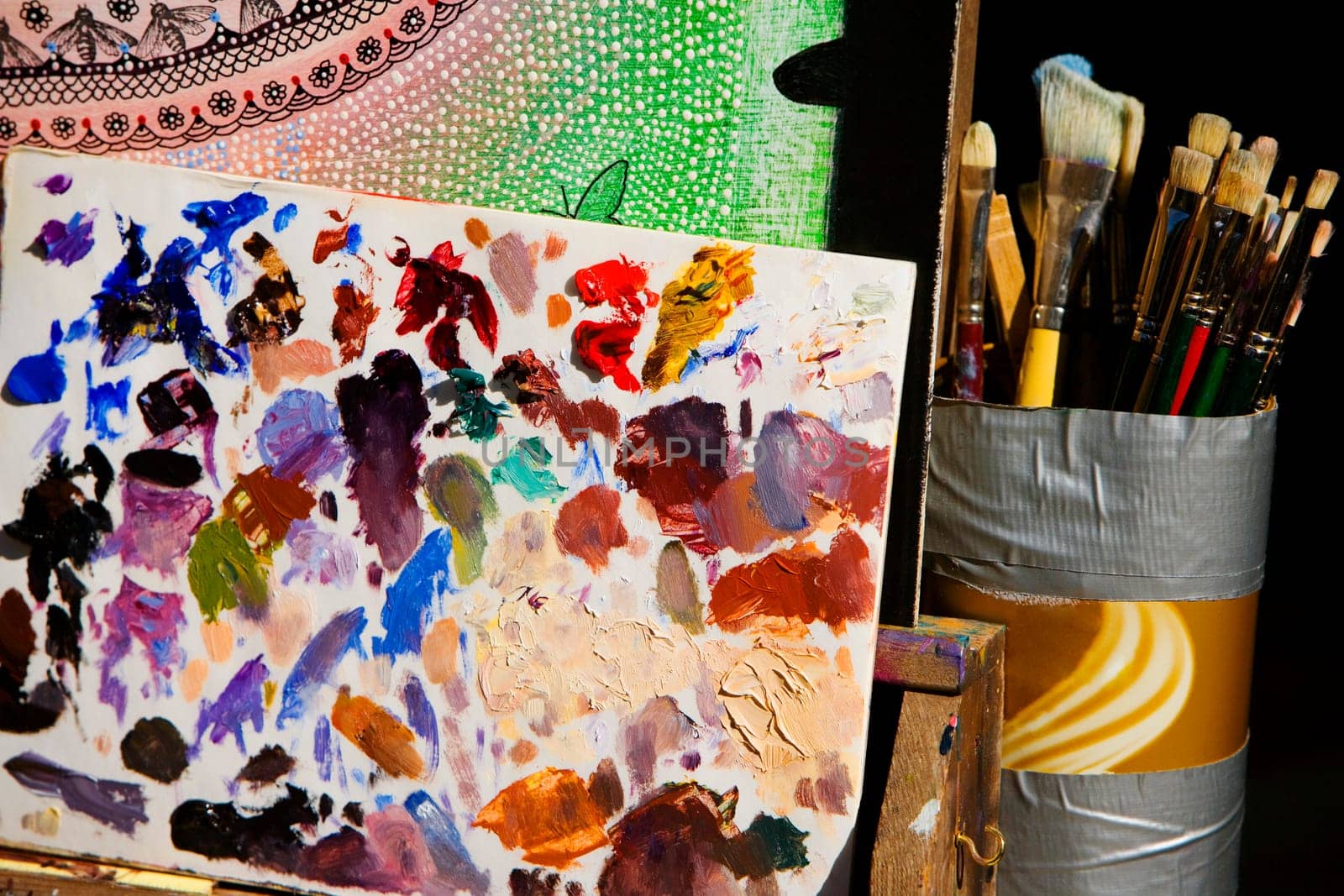 Close-up of paintbrushes with a palette