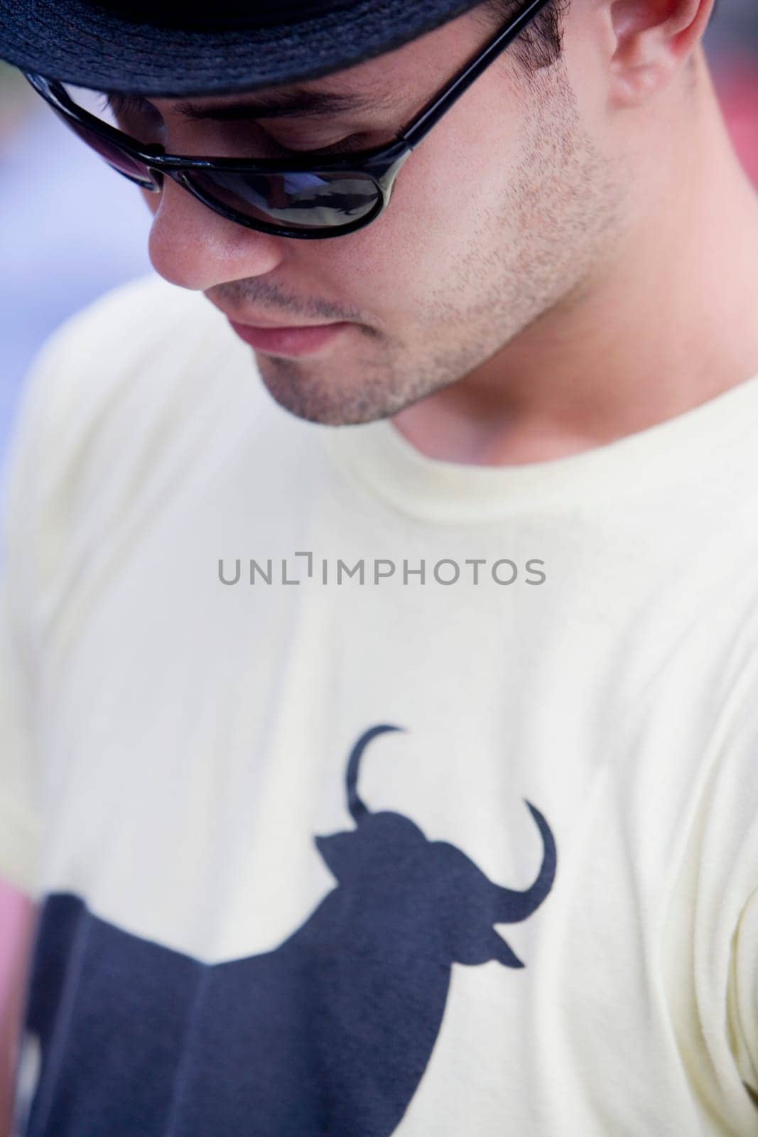 Close-up of a young man looking down