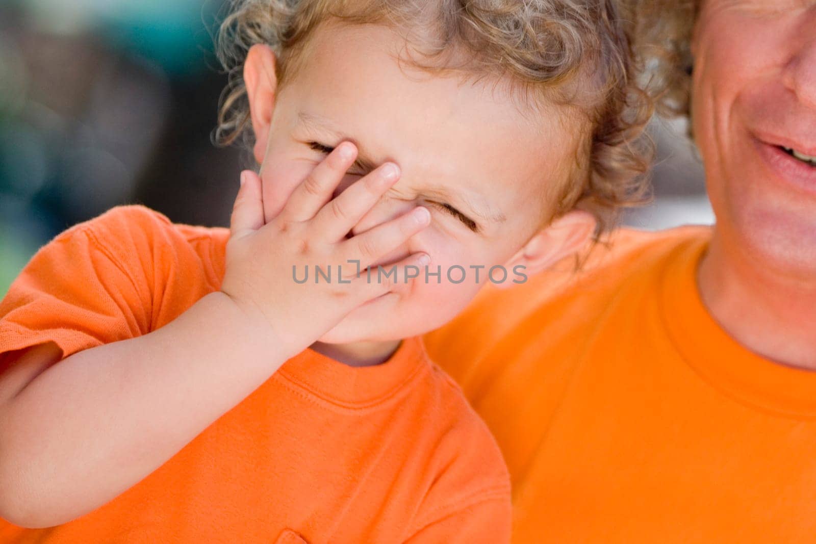 Close-up of a boy with his grandfather