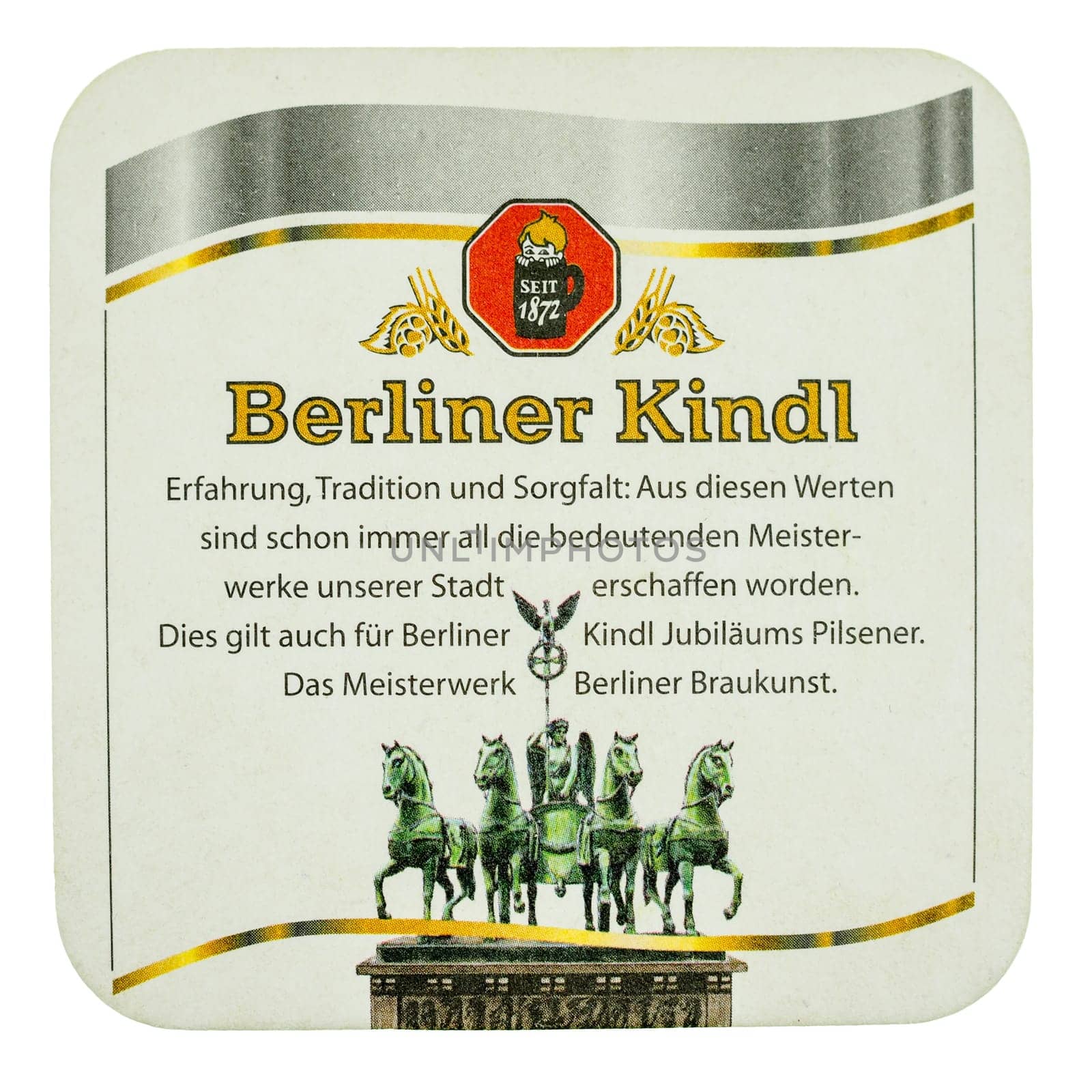 BERLIN, GERMANY - MARCH 15, 2015: Beermat of German beer Berliner Kindl isolated over white background