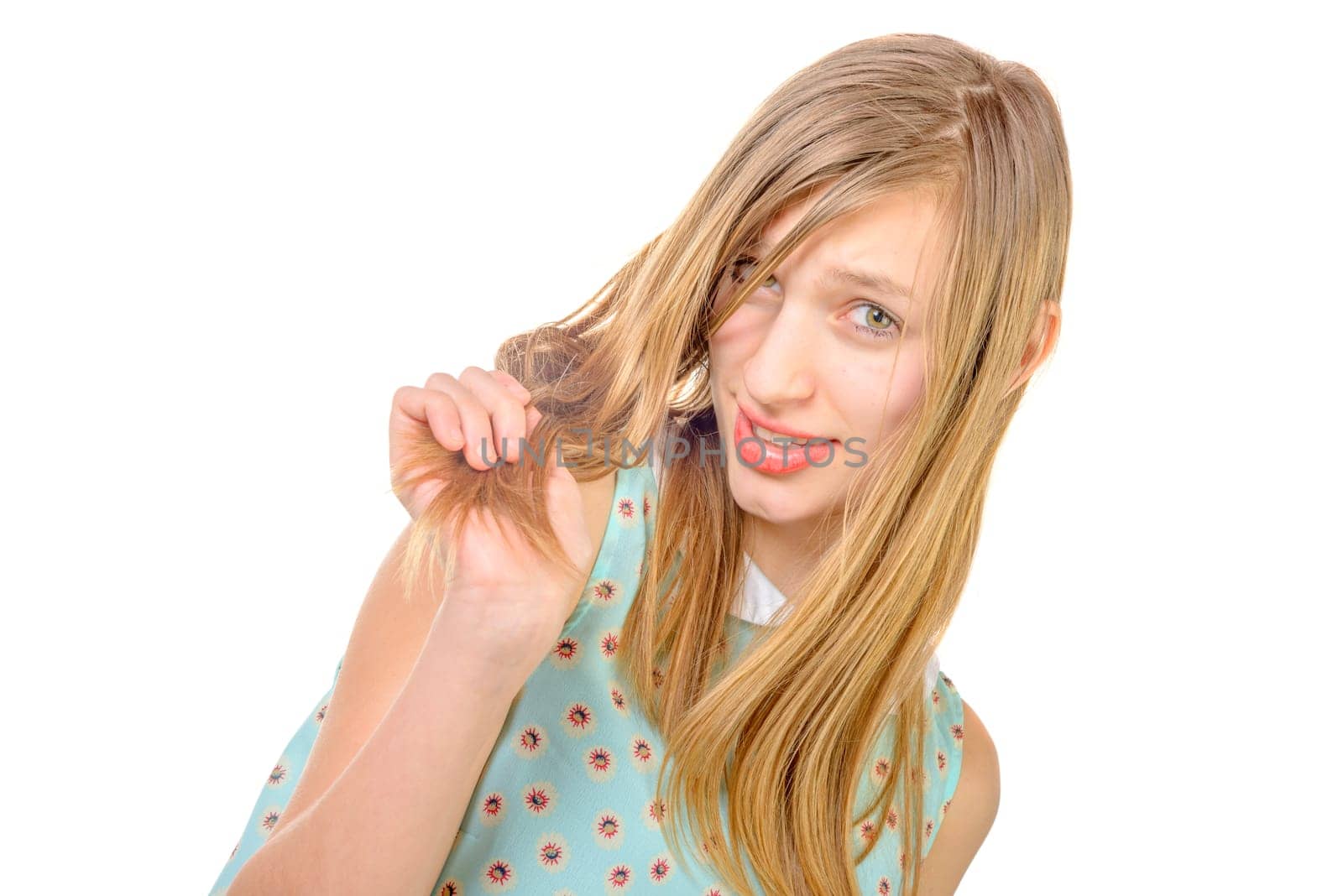 portrait of a smiling teenage girl on the white background