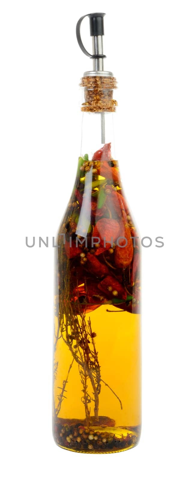 bottle with hot peppers and aromas