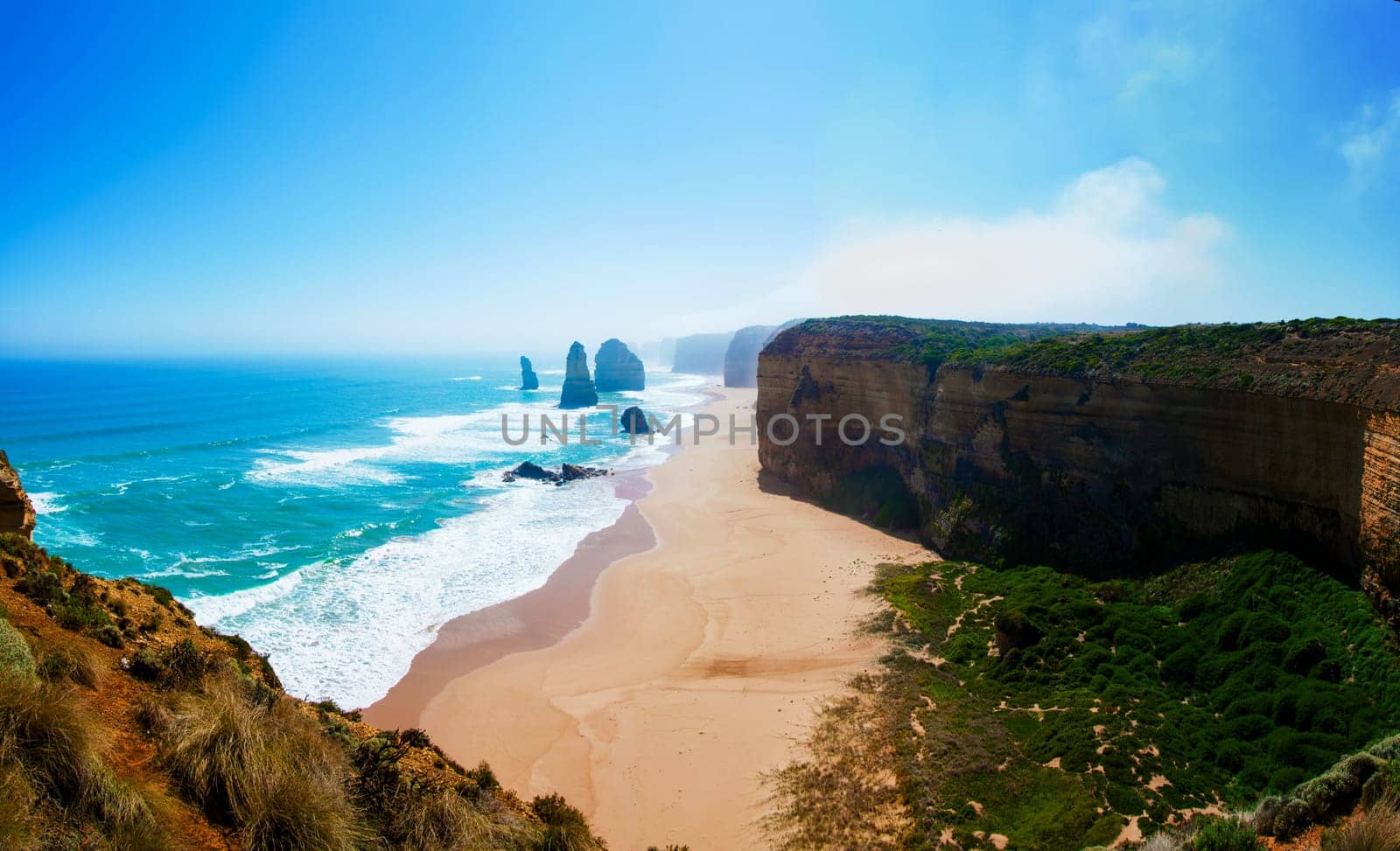 The Twelve Apostles, a famous collection of limestone stacks off the shore of the Port Campbell National Park, by the Great Ocean Road in Victoria, Australia