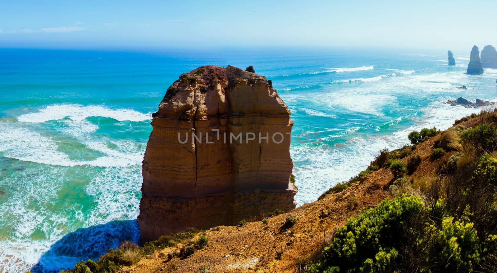 The Twelve Apostles, a famous collection of limestone stacks off the shore of the Port Campbell National Park, by the Great Ocean Road in Victoria, Australia