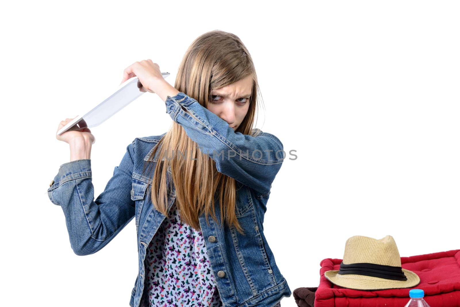 angry teenager with a digital tablet