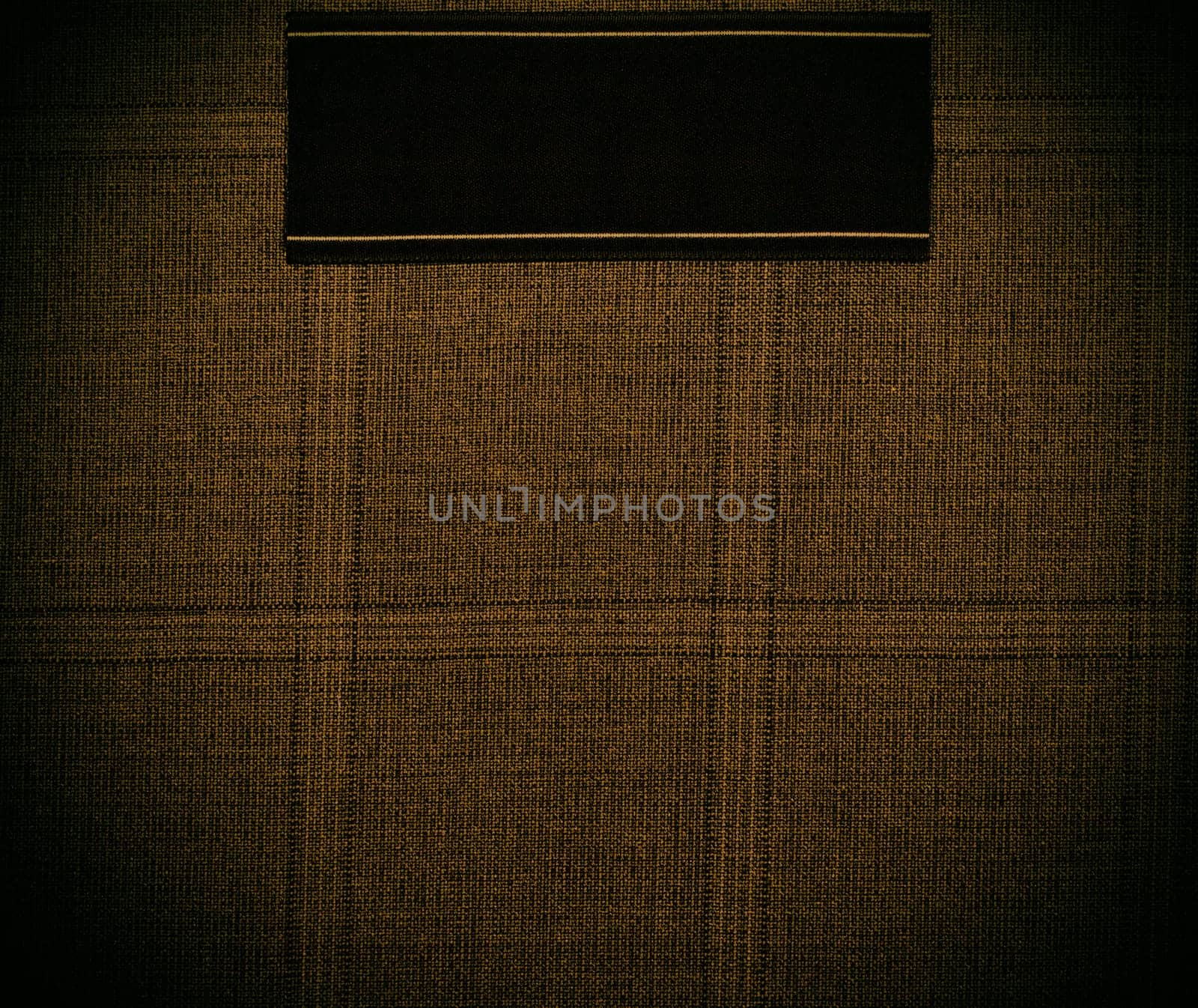 dark gold background of textile texture. close up
