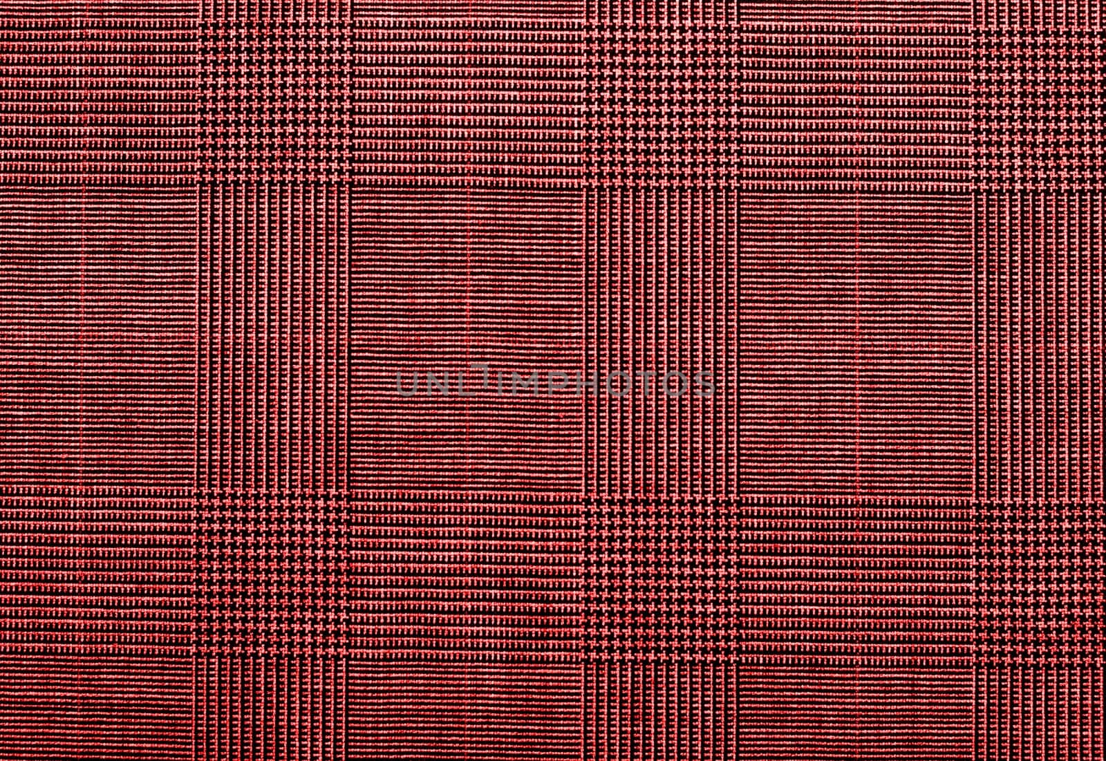 red background of textile texture. close up