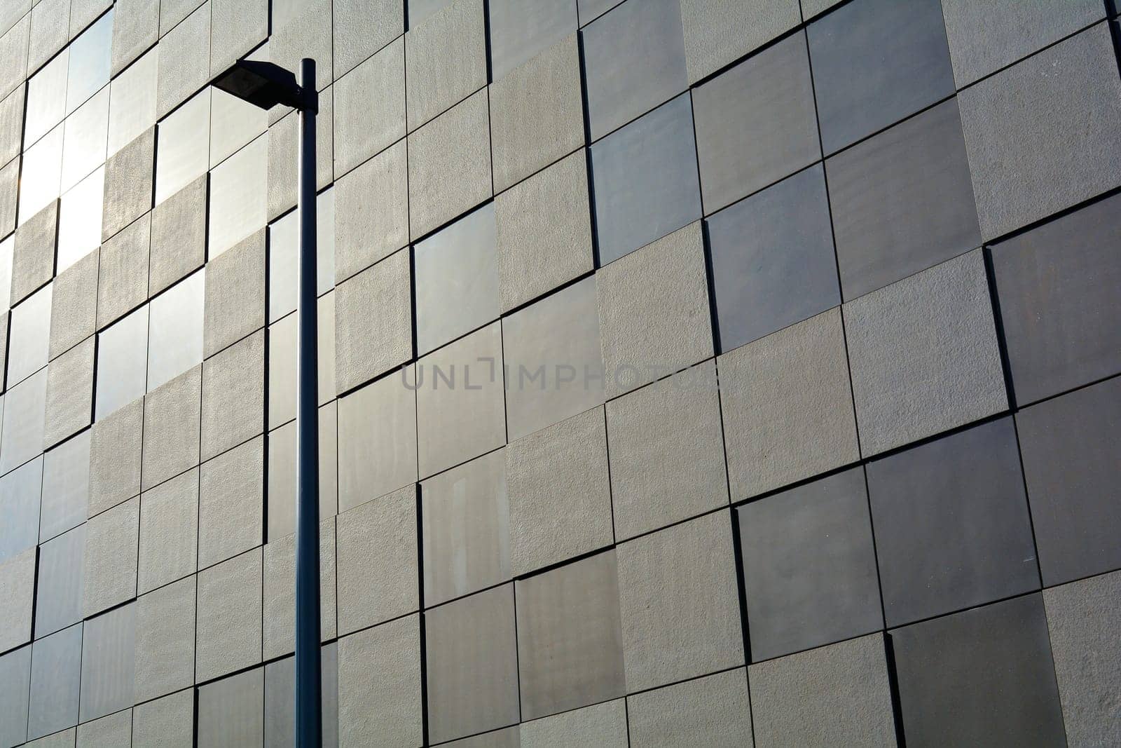 Facade of a modern building with street lamp in Magdeburg