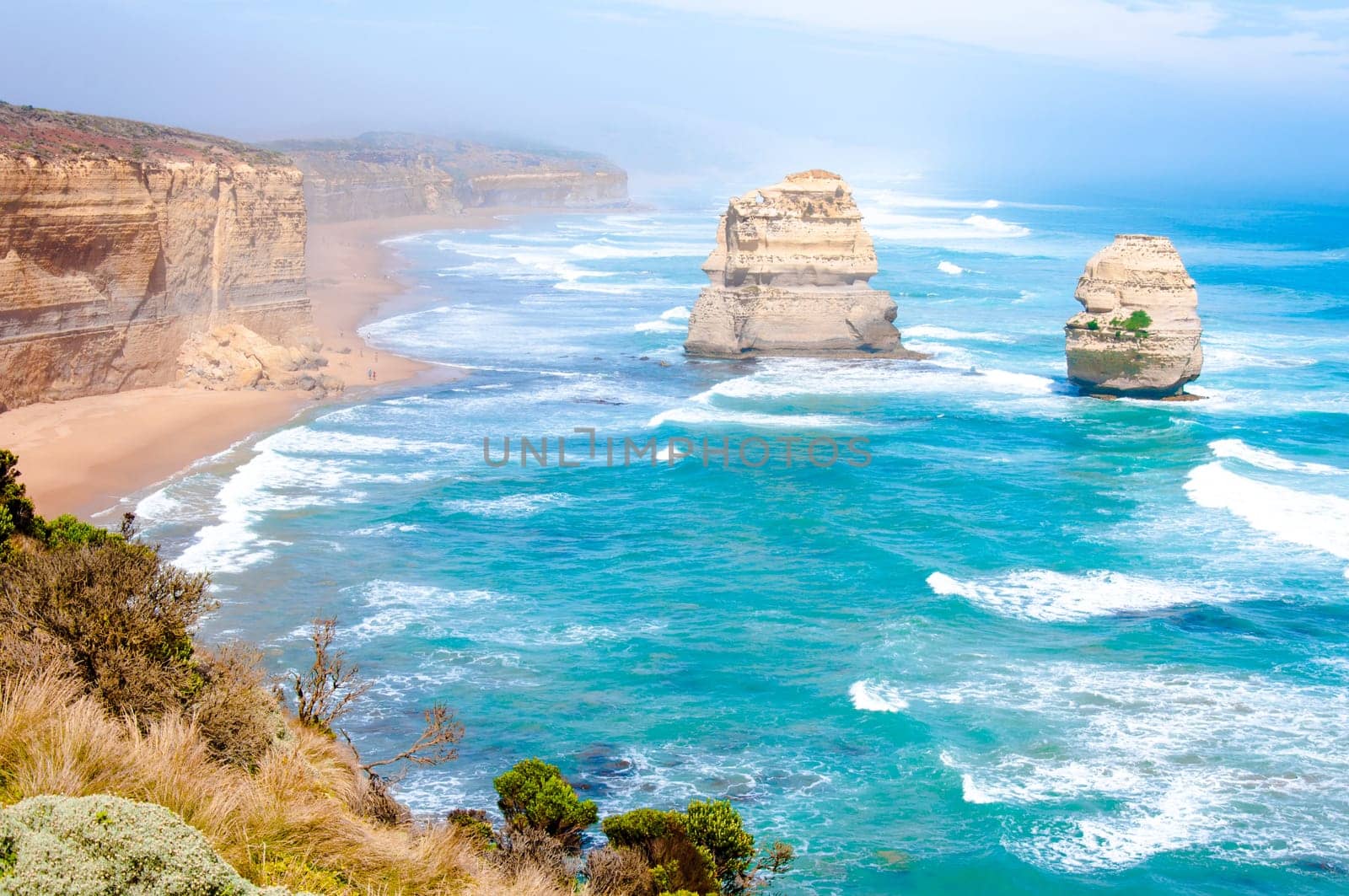 The Twelve Apostles, a famous collection of limestone stacks off the shore of the Port Campbell National Park, by the Great Ocean Road in Victoria, Australia