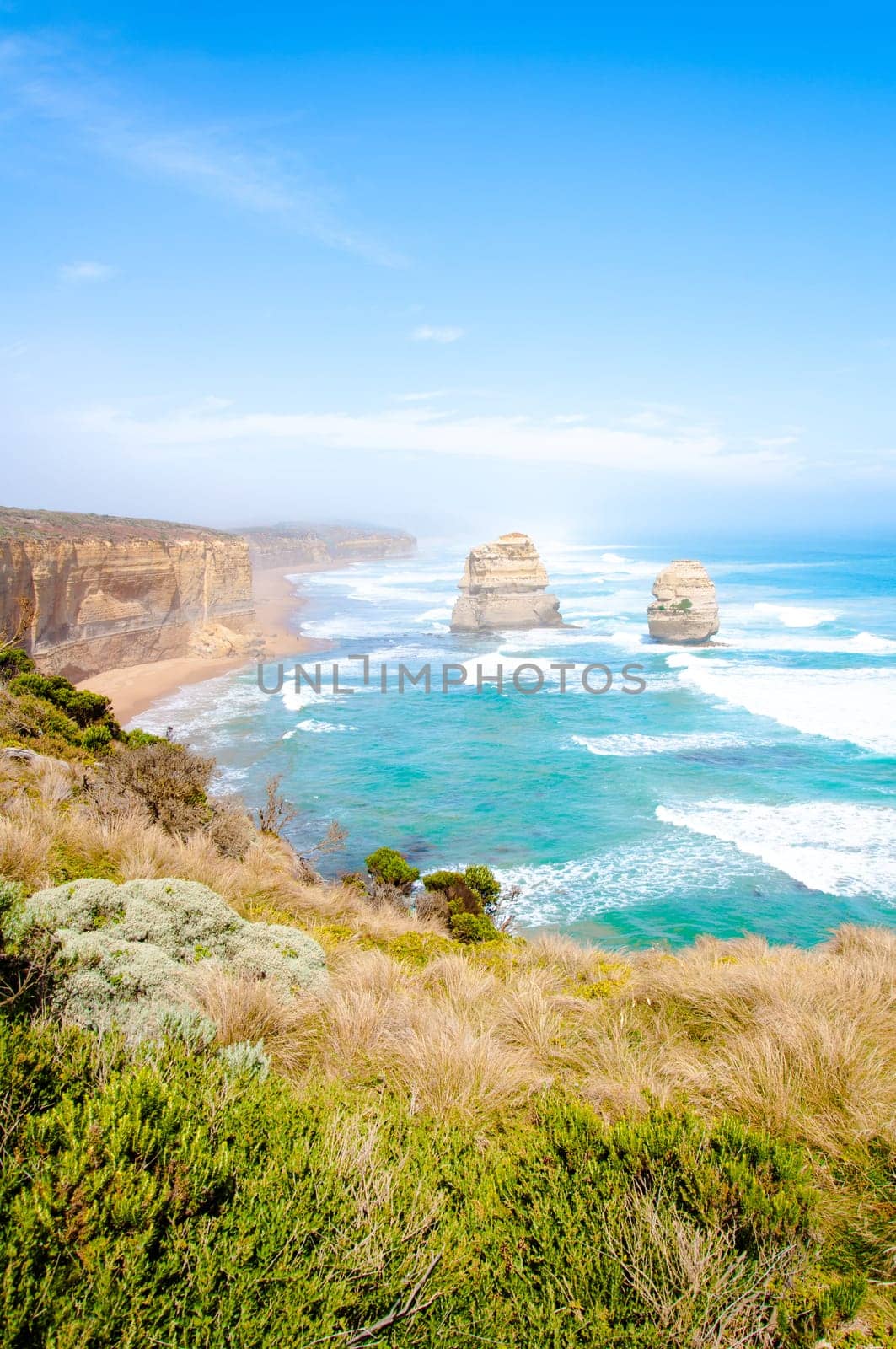 The Twelve Apostles, a famous collection of limestone stacks off the shore of the Port Campbell National Park, by the Great Ocean Road in Victoria, Australia