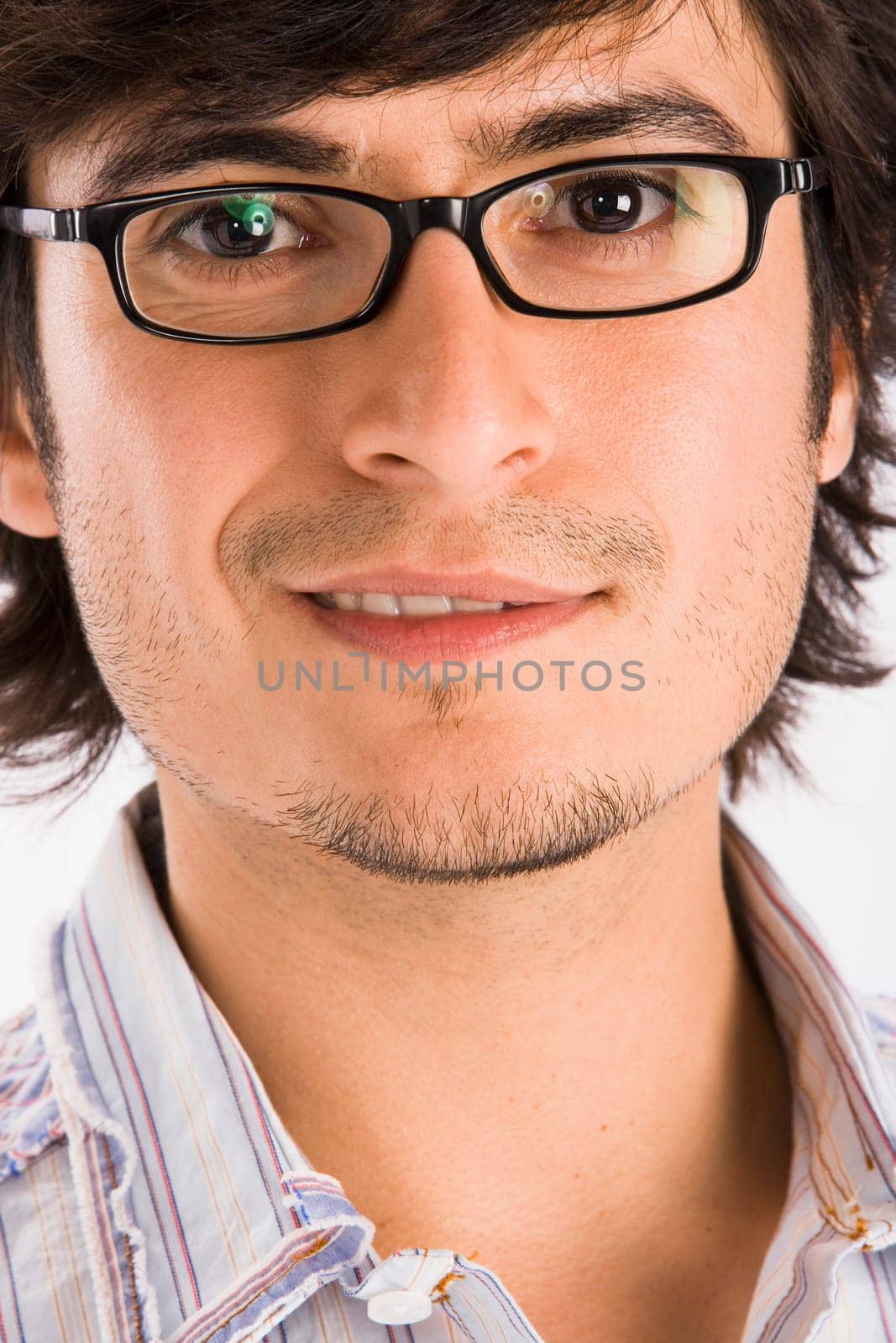 Studio portrait of young man