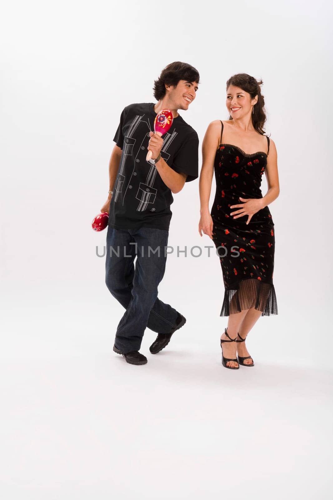 Studio portrait of couple dancing