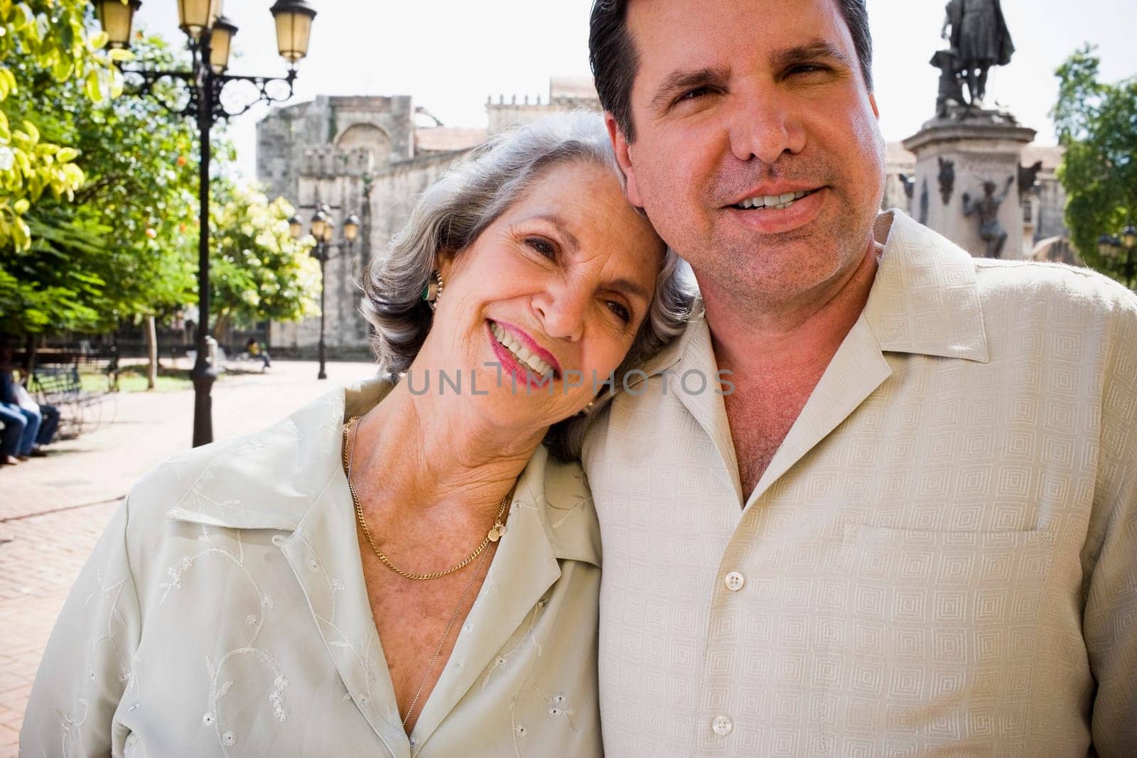 Close-up of a senior woman with her son smiling, Santo Domingo, Dominican Republic
