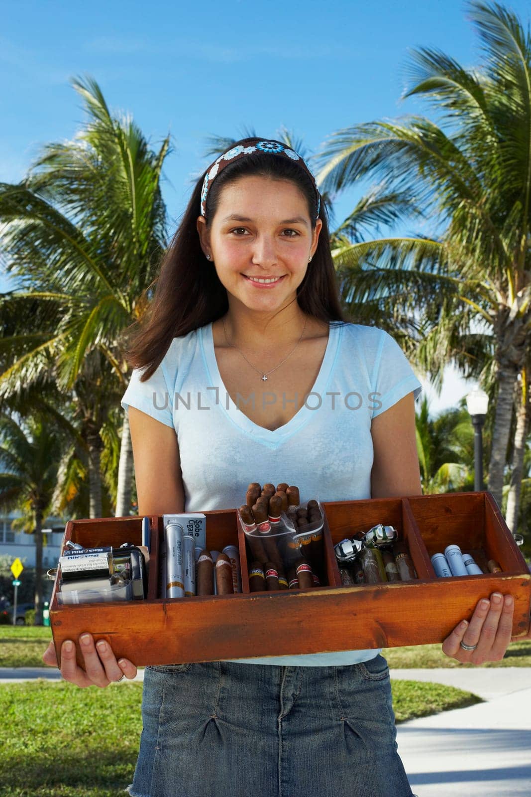 Woman selling cigars at beach