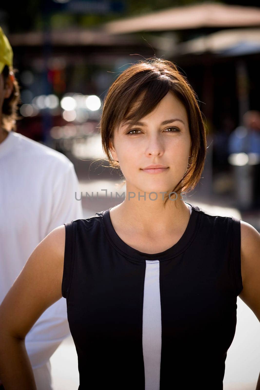 Young woman exercising with physical trainer