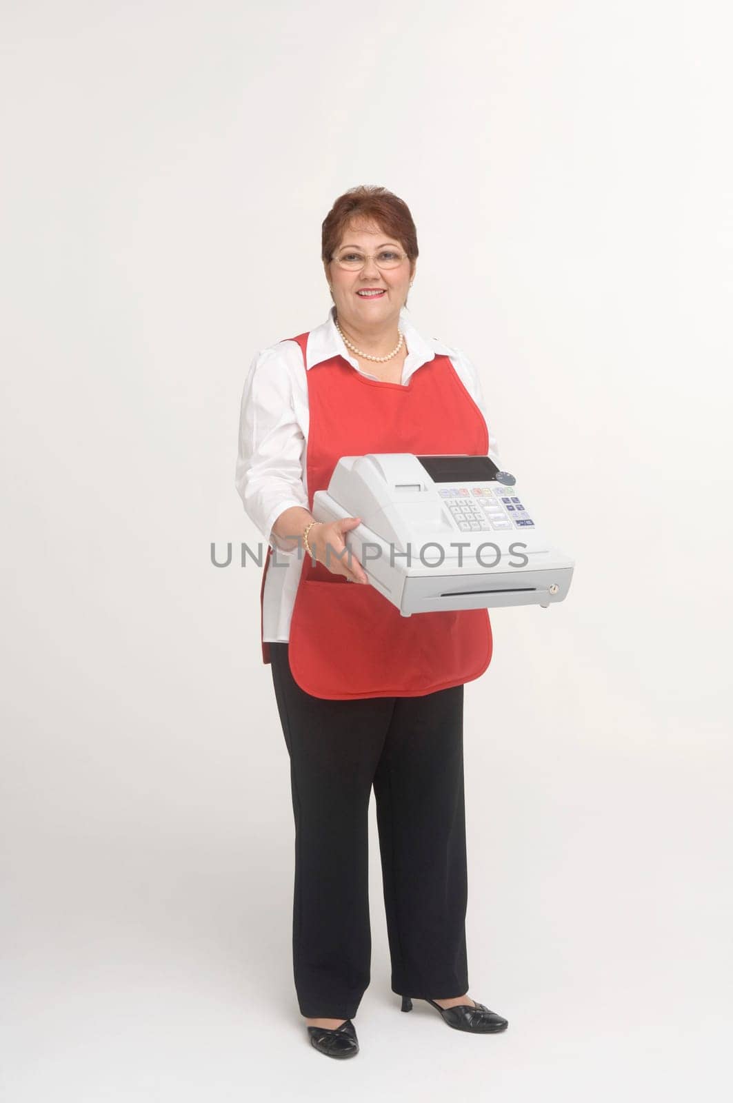 Cashier holding cash register