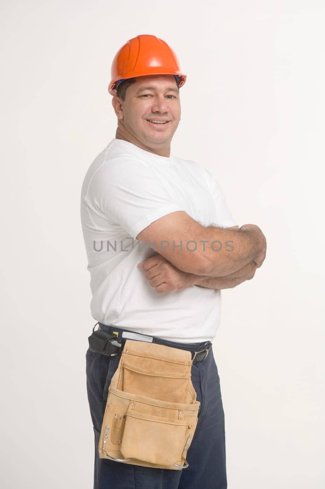 Construction worker, arms crossed