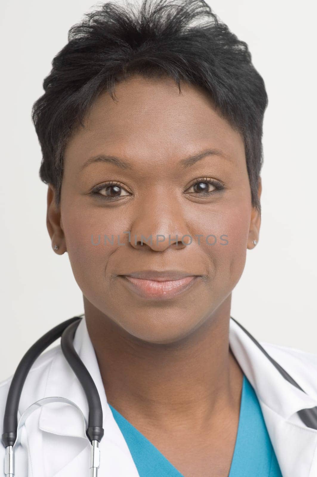 Portrait of doctor looking at camera
