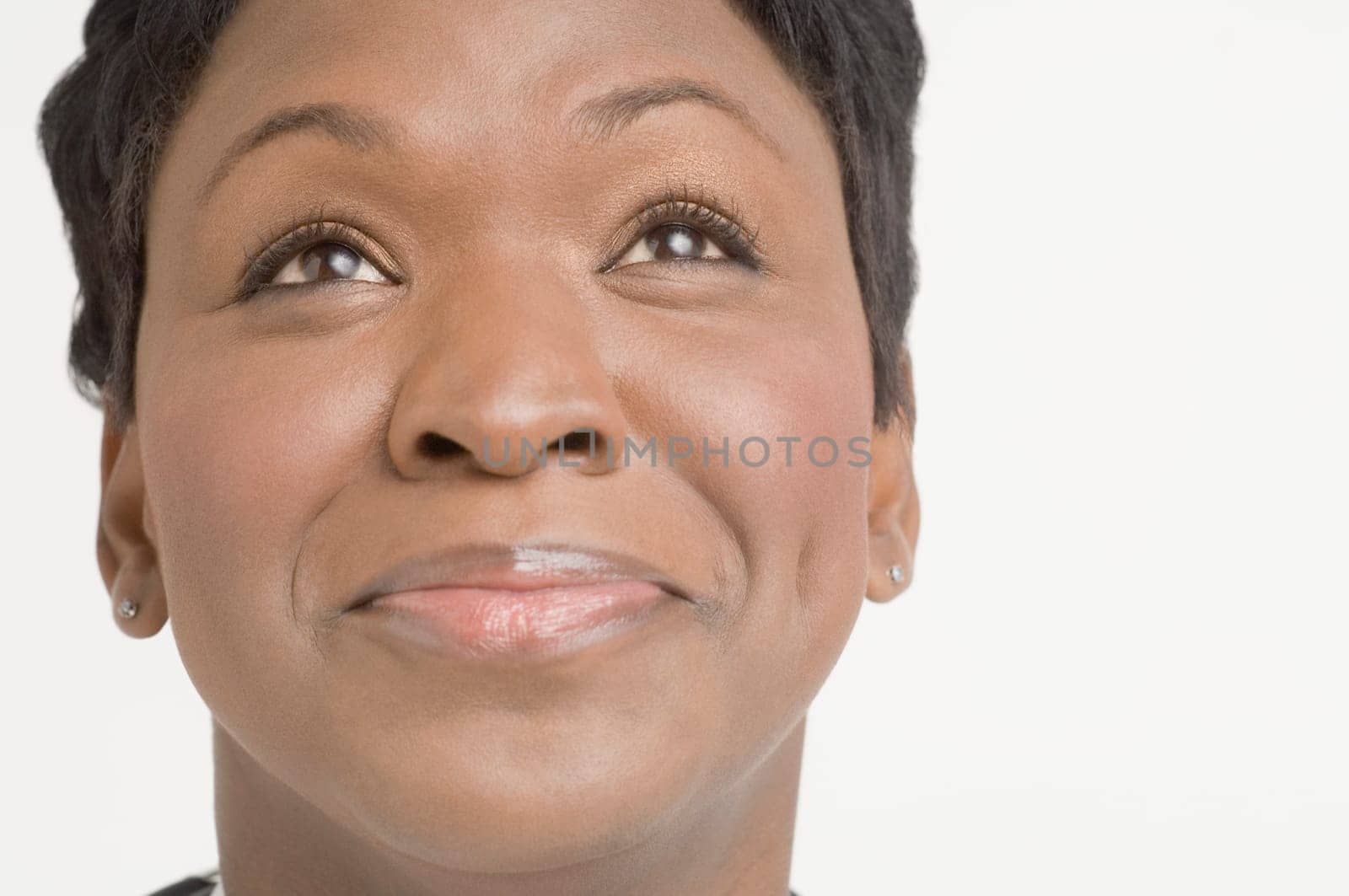 Portrait of doctor looking up
